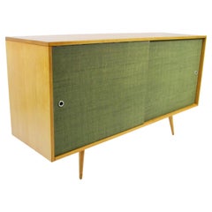 Credenza de puertas correderas Paul McCobb Planner Group con firma Early Branded