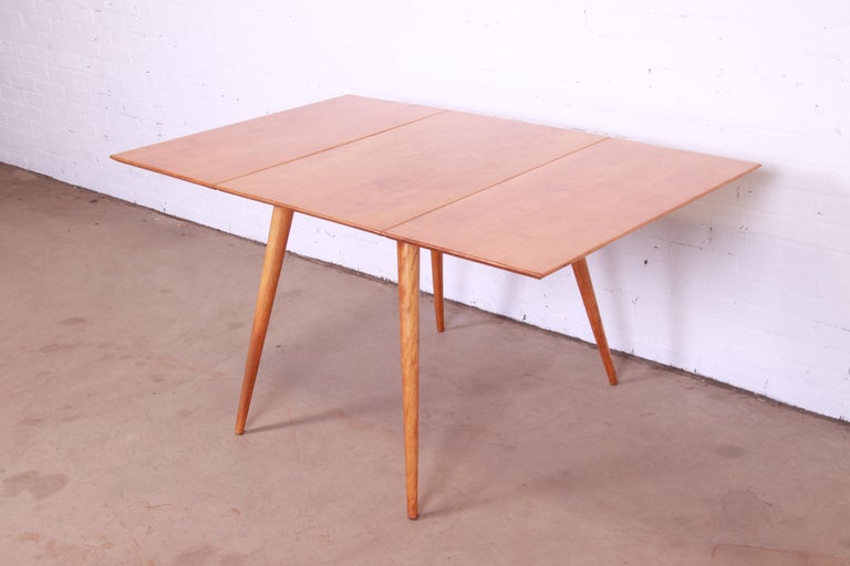 An exceptional Mid-Century Modern solid maple drop-leaf dining table

By Paul McCobb for Winchendon Furniture, 