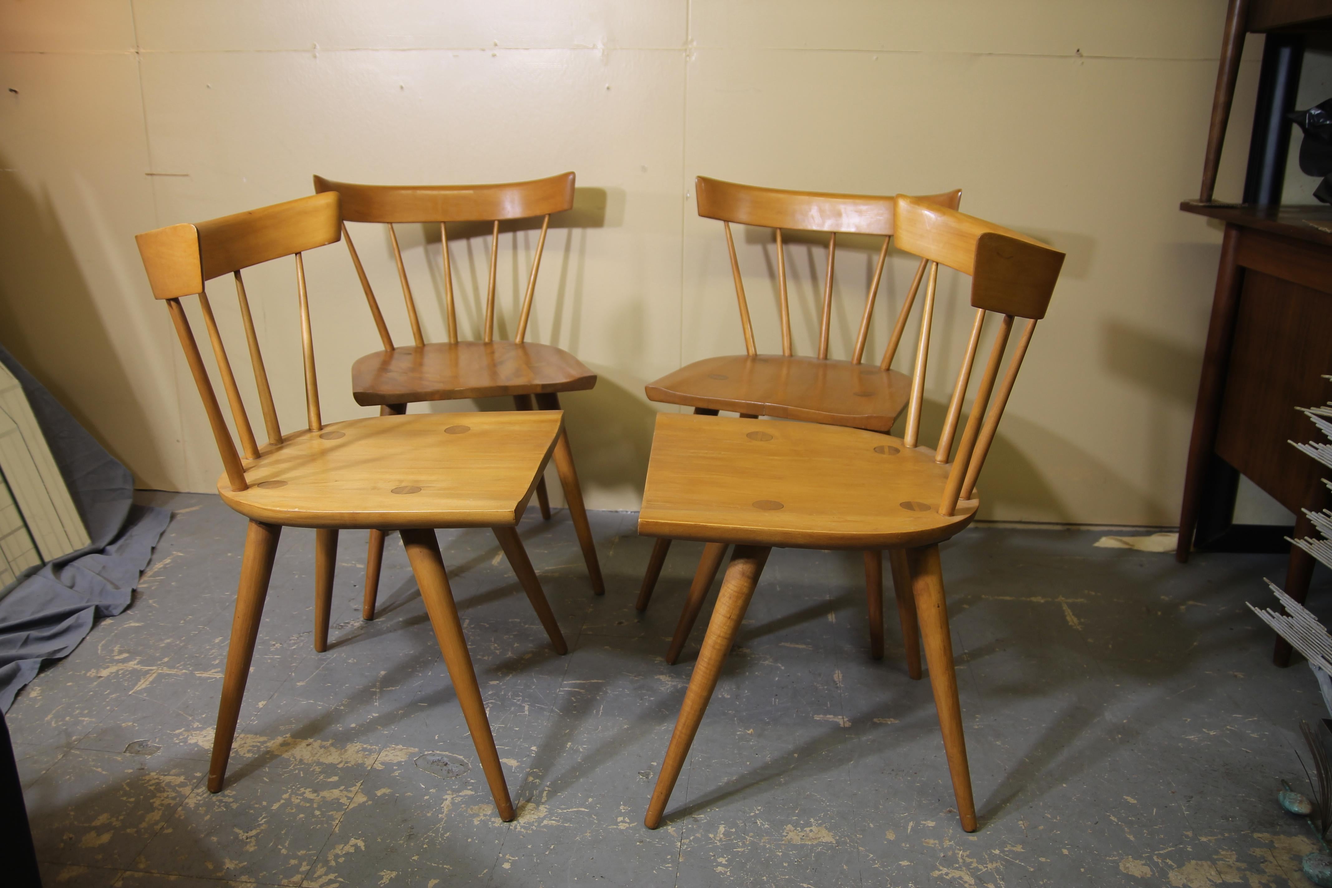 Classic Windsor style chair by Paul McCobb. This is a for a set of 4 solid Mable chairs. This chair was made by Winchendon Furniture in the 1950s.