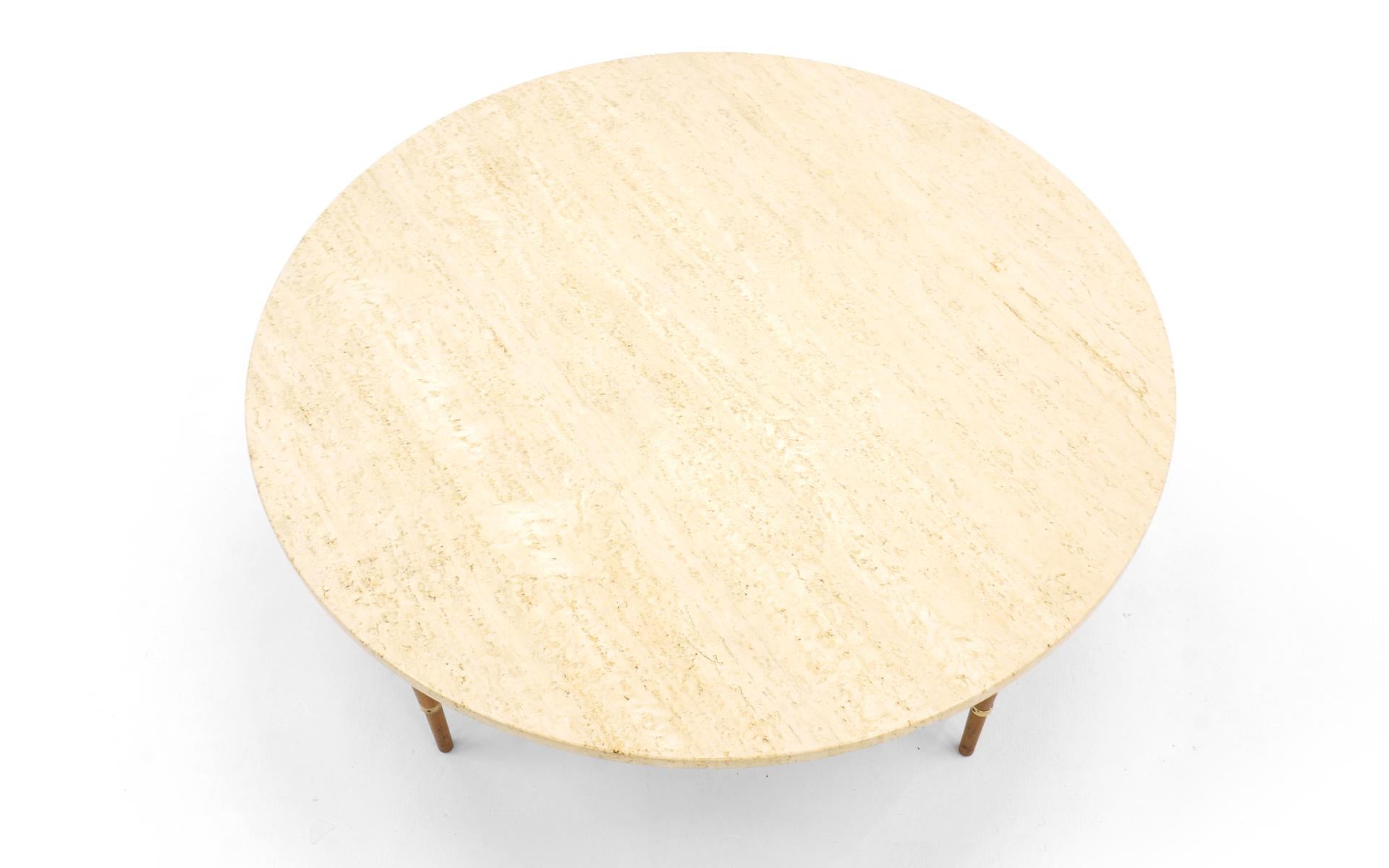 Paul McCobb coffee table from the Connoisseur collection for Calvin. This example is all original and in beautiful condition. The original Travertine top has natural imperfection as expected on some edges and the top is smooth and in fine condition.