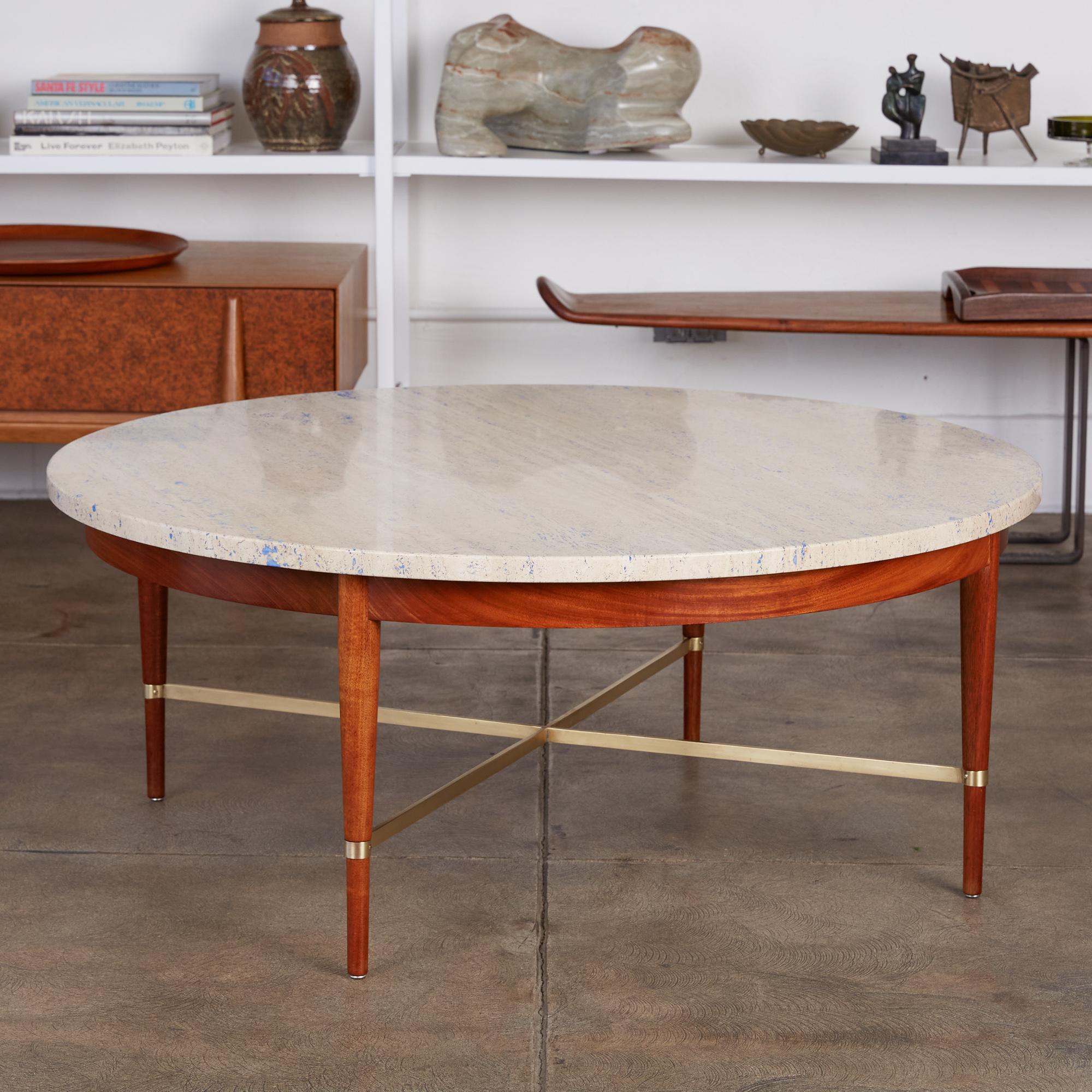 Paul McCobb travertine top coffee table for Calvin Furniture, circa 1950s. This table was part of Calvin’s “Irwin Collection”, which was a higher end line that McCobb designed for them. The line featured many different wood cabinet and table designs