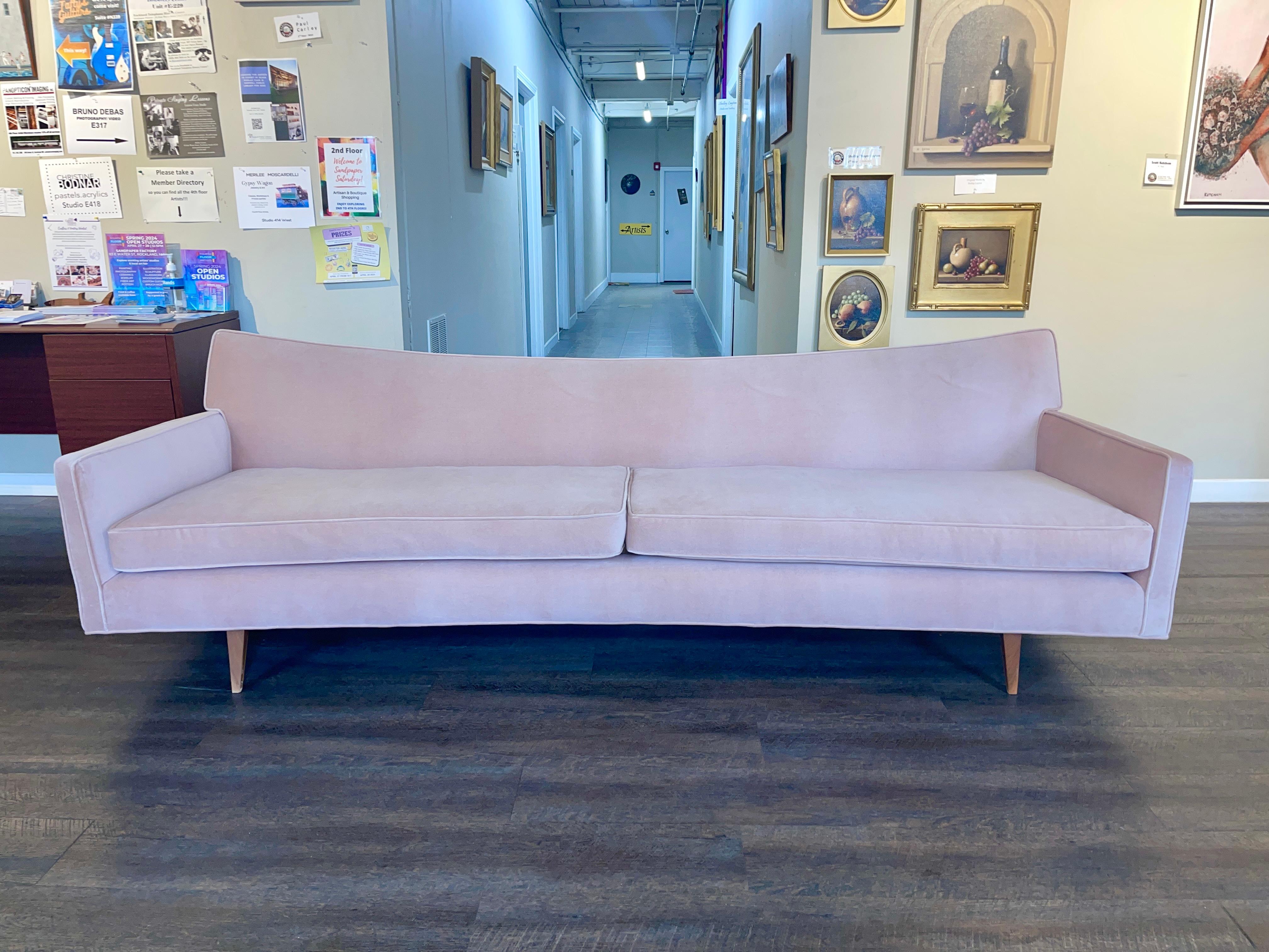 Paul McCobb shaped back sofa model 3137.
Manufactured by Custom Craft, USA.
7” Wood splayed legs.
Newly reupholstered in JB Martin pink velvet.
Arm height 23.5”
Seat depth 25”
Off the floor 7”
