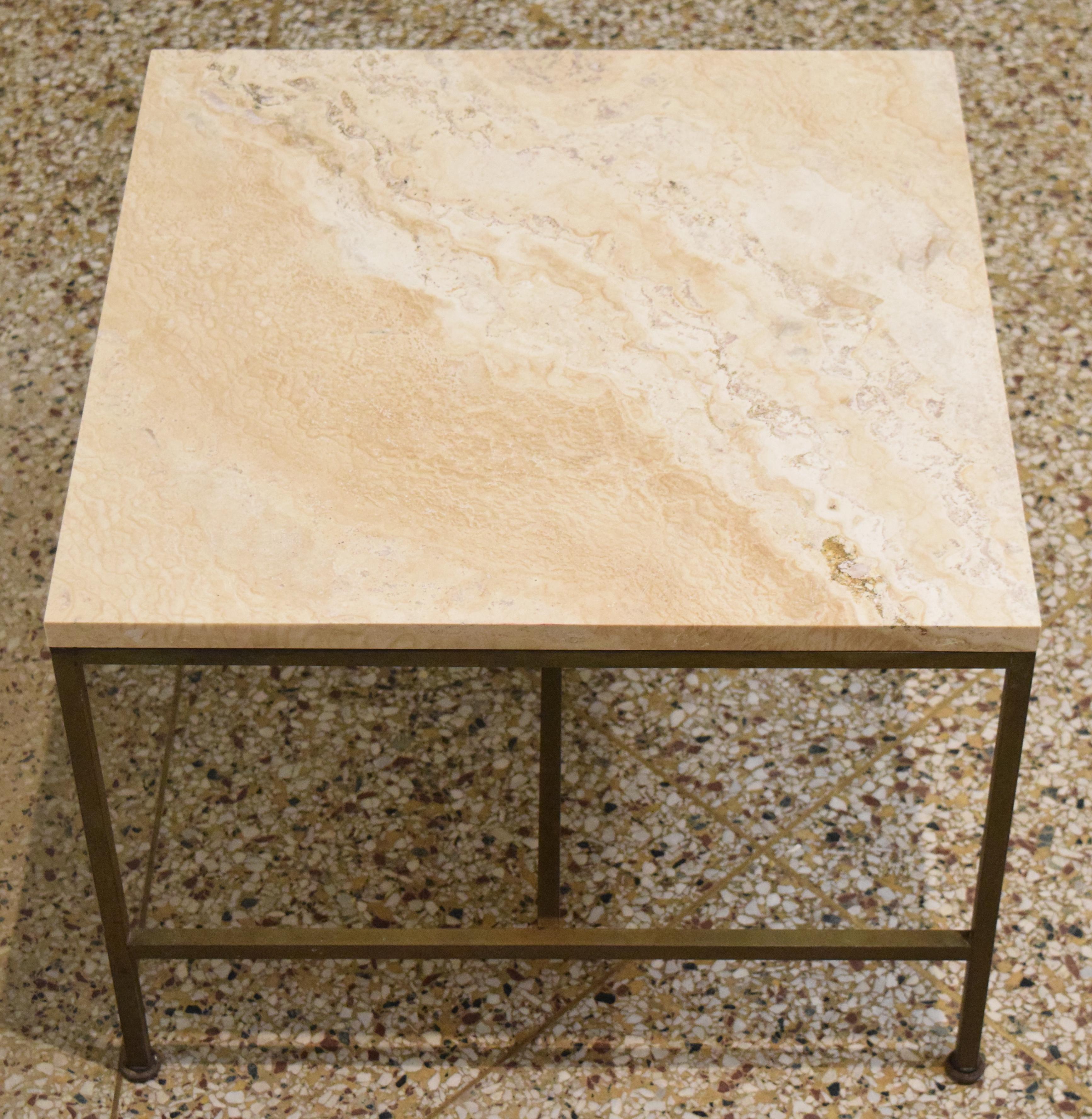 Paul McCobb occasional table model C8732 from the Irwin collection for Calvin. New custom top in honed and filled Durango travertine resting on brass tubular base. Original white vitrolite top also available if preferred; please contact for details.