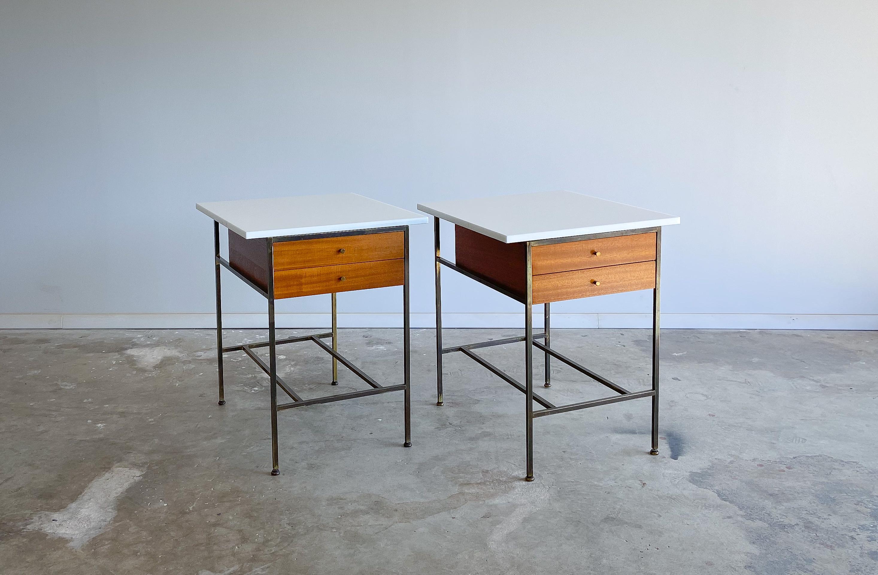 We are excited to offer this rare set of side tables or nightstands designed by Paul McCobb for Calvin Furniture.

Part of the Irwin Collection, originally designed in 1952. These are, in our opinion, one of McCobb's finest designs. The