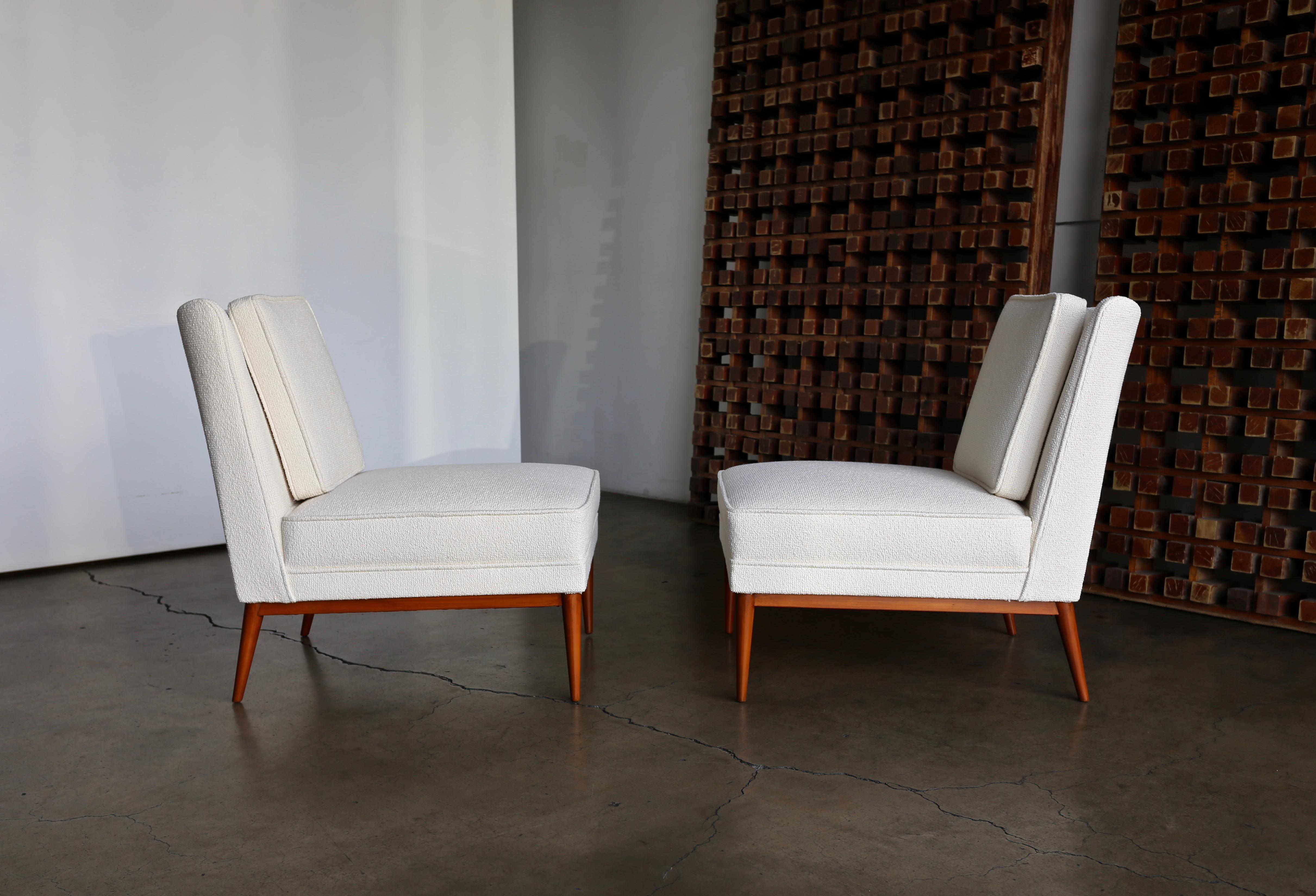 Pair of Paul McCobb slipper lounge chairs Model 300 for Custom Craft Inc. circa 1952. This pair has been professionally restored.

 