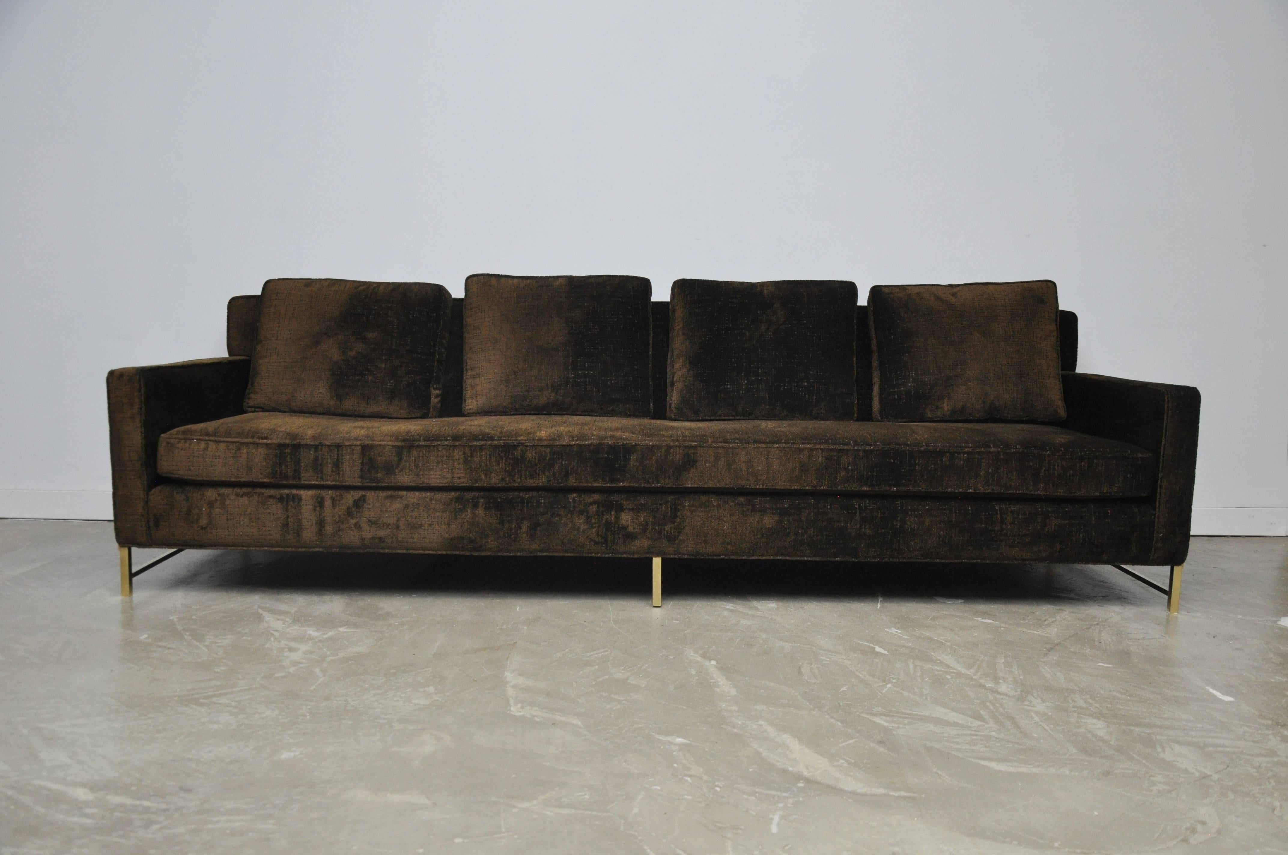 Sofa by Paul McCobb for Directional Furniture. Fully restored and reupholstered in Great Plaines textured velvet over polished brass stretcher bases.