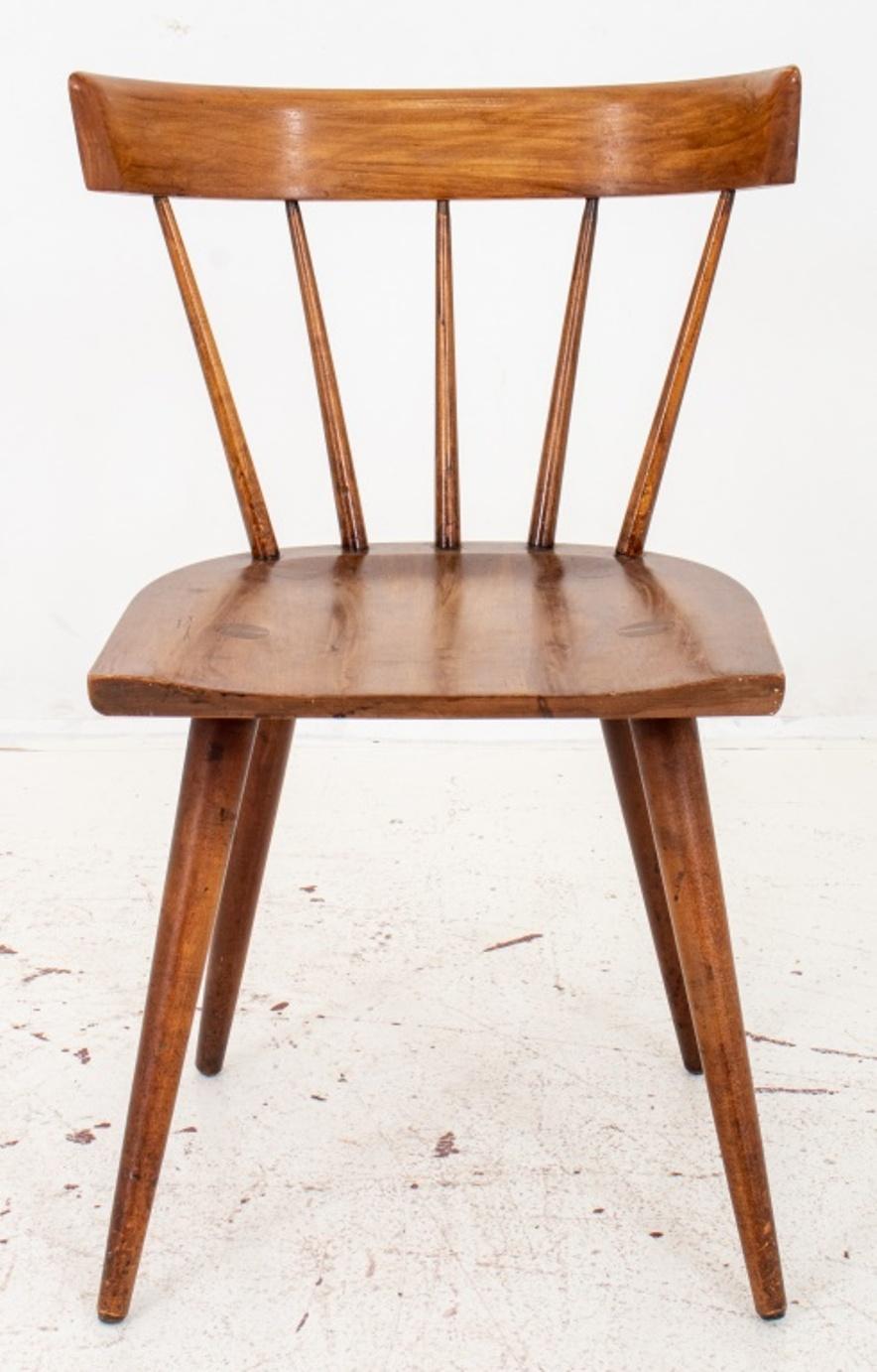 Paul McCobb (American, 1917-1969) for Winchendon, Spindle Back Planner Group Chair (designed 1950) ca. 1950s or later, the curved backrest on five tapering spindles above a shaped seat on four tapering cylindrical legs. In good vintage condition.
