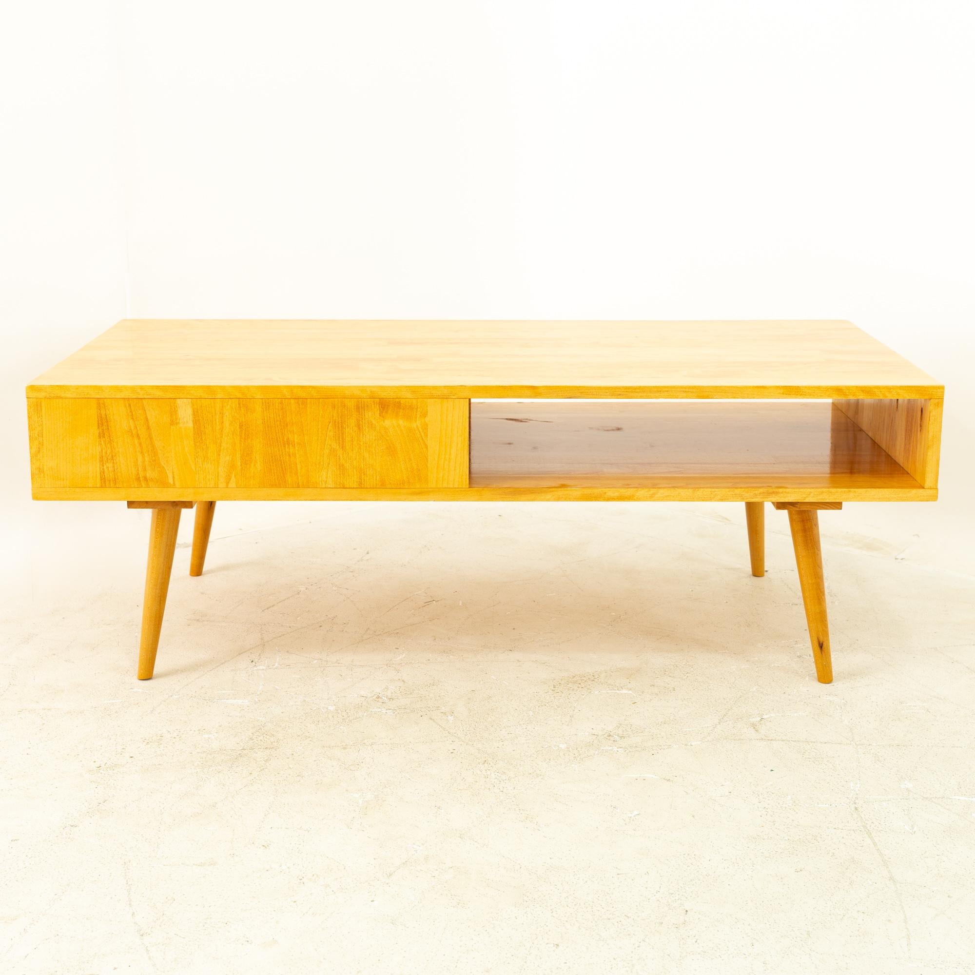 Paul McCobb Style Mid Century Blonde Coffee Table 
50 wide x 24.25 deep x 17.75 high

All pieces of furniture can be had in what we call Restored Vintage Condition. This means the piece is restored upon purchase so it’s free of watermarks, chips or