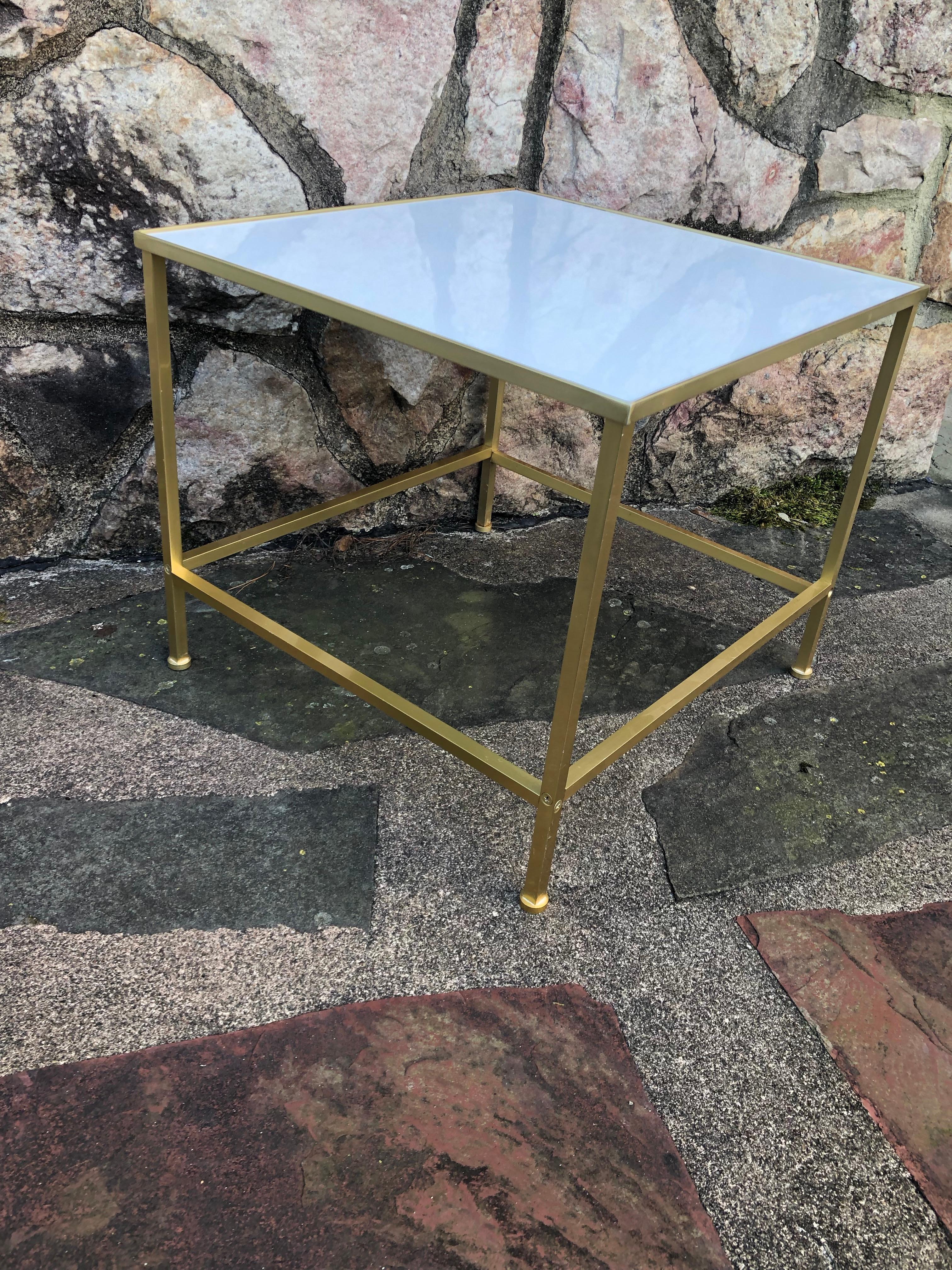 Paul McCobb style brass frame side table with white Vitrolite glass top.