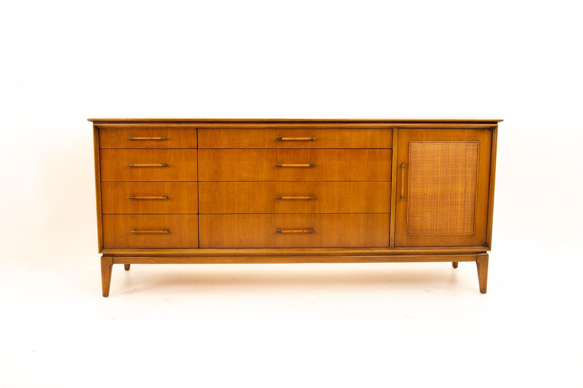 Paul McCobb style century furniture Mid Century walnut and cane 12-drawer lowboy dresser
Dresser measures: 72 wide x 19.5 deep x 32.5 high

All pieces of furniture can be had in what we call restored vintage condition. That means the piece is