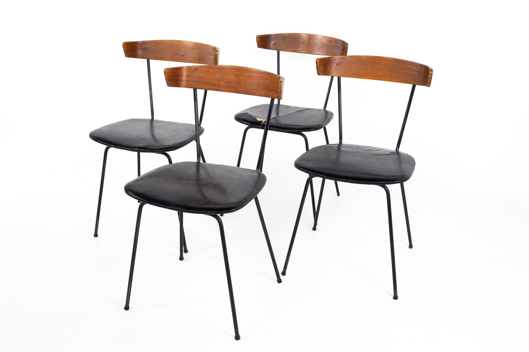 Paul McCobb Style Clifford Pascoe mid century walnut and wrought iron dining chairs - Set of 4
Each chair measures: 16 wide x 18.25 deep x 30 high, with a seat height of 18.25 inches 

All pieces of furniture can be had in what we call restored