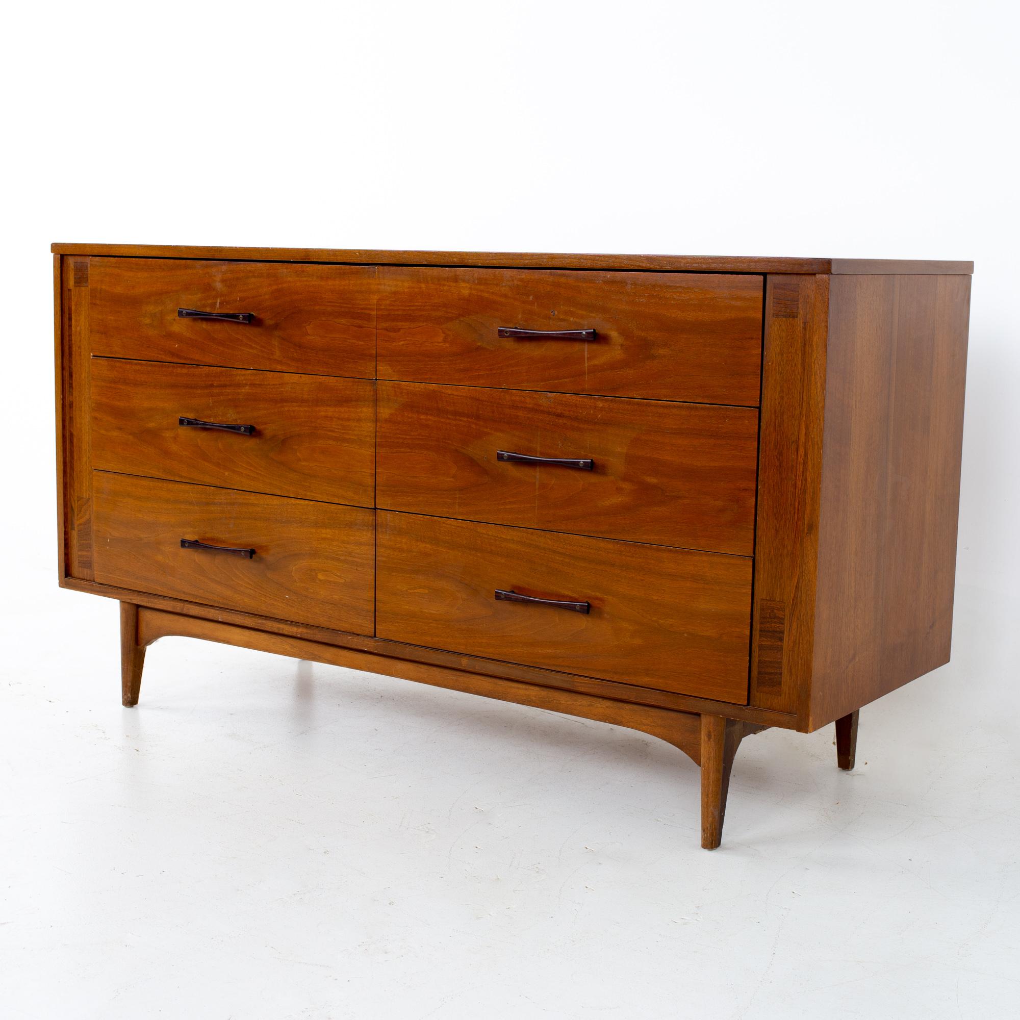 Paul McCobb Style Kroehler mid century walnut and rosewood 6 drawer dresser
Dresser measures: 56 wide x 19 deep x 30.75 inches high

All pieces of furniture can be had in what we call restored vintage condition. That means the piece is restored