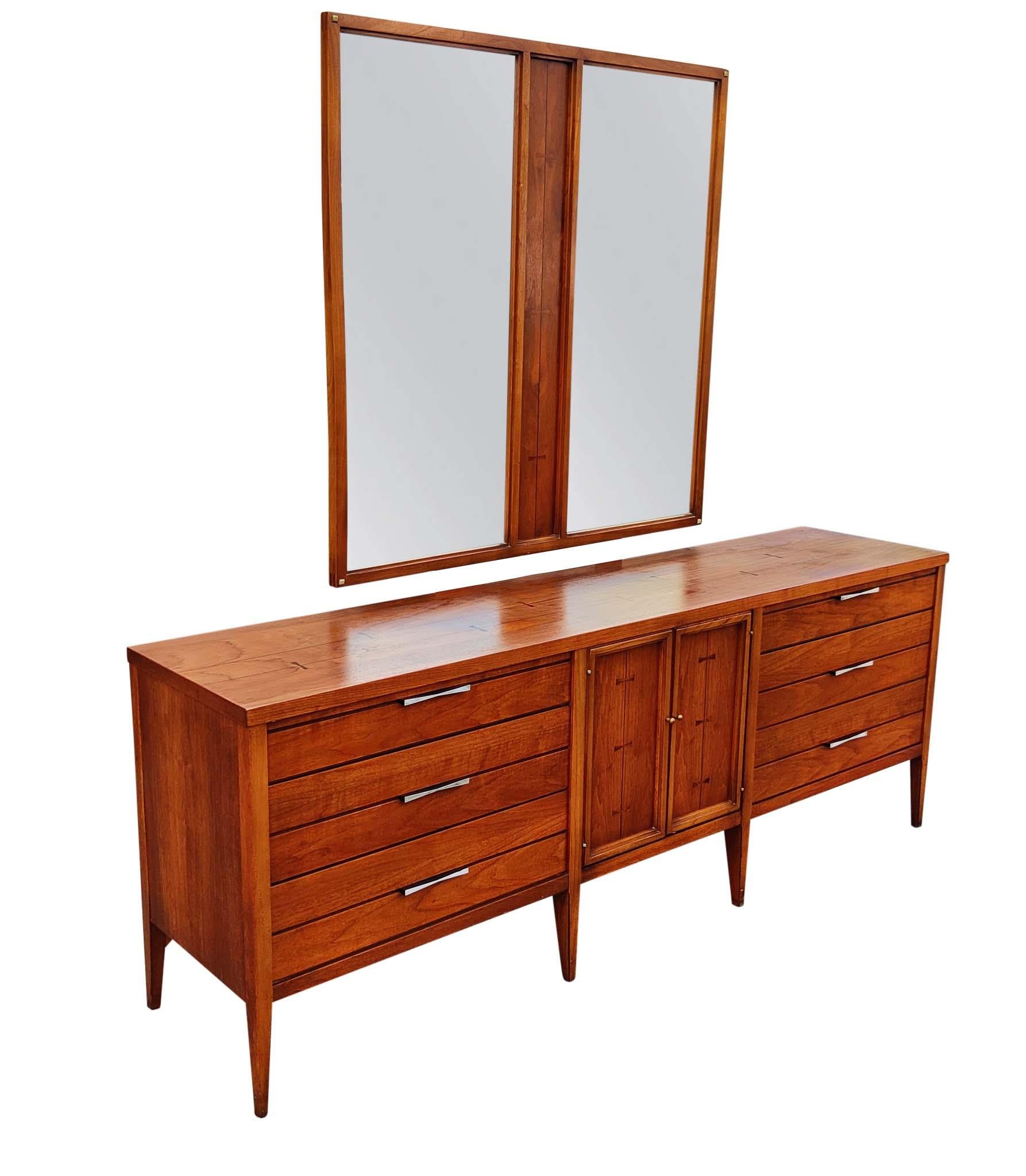 Please note that I have the entire bedroom set at this time - See last picture. Long Dresser with Mirror. Tall Dresser.  Pair Nightstands. Group Discount Available. 

Large, exceptional Mid-Century Modern walnut & rosewood dresser manufactured in