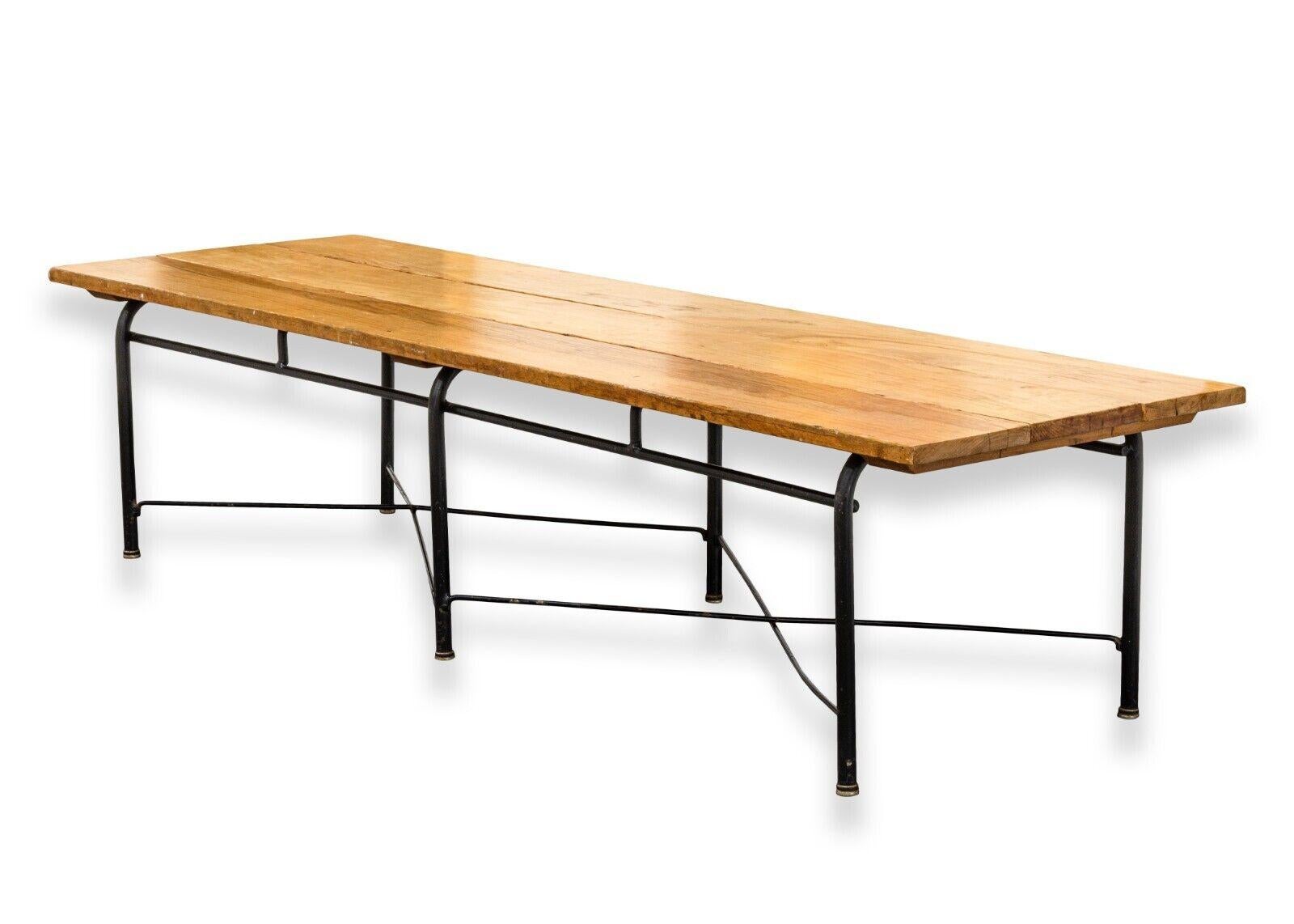 A stylish and sturdy bench that adds a touch of mid-century modern charm to any indoor space. Crafted with a combination of wood and metal materials, this Paul McCobb style bench measures 64 inches in length, 19.5 inches in width, and 15 inches in