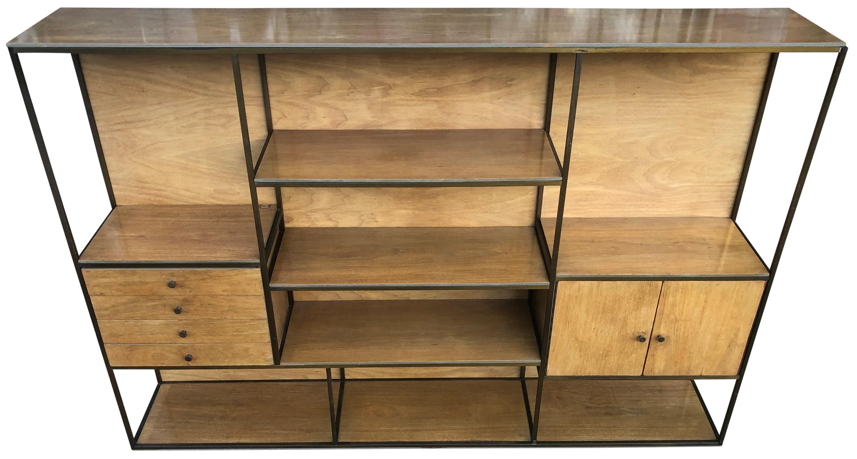 Paul McCobb style midcentury low brass bookcase shelf unit room divider with shelves, drawers and cabinet. Furnette Manufacturer circa 1960s solid light wood with four drawers. All original brass pulls. Has solid brass tubular structure. All