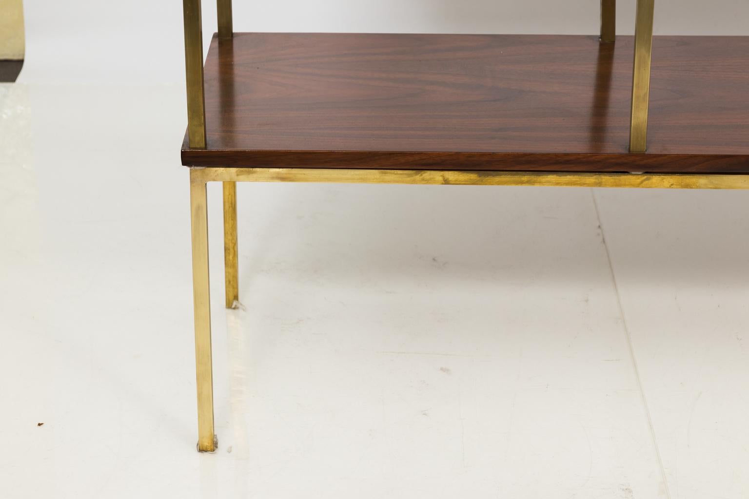 Attributed to Paul McCobb according to original owners of the piece. This 1960s wall unit consists of drop-down bar unit with brass supports, open shelve units as well as concealed storage shelves. Restored to pristine condition.
 