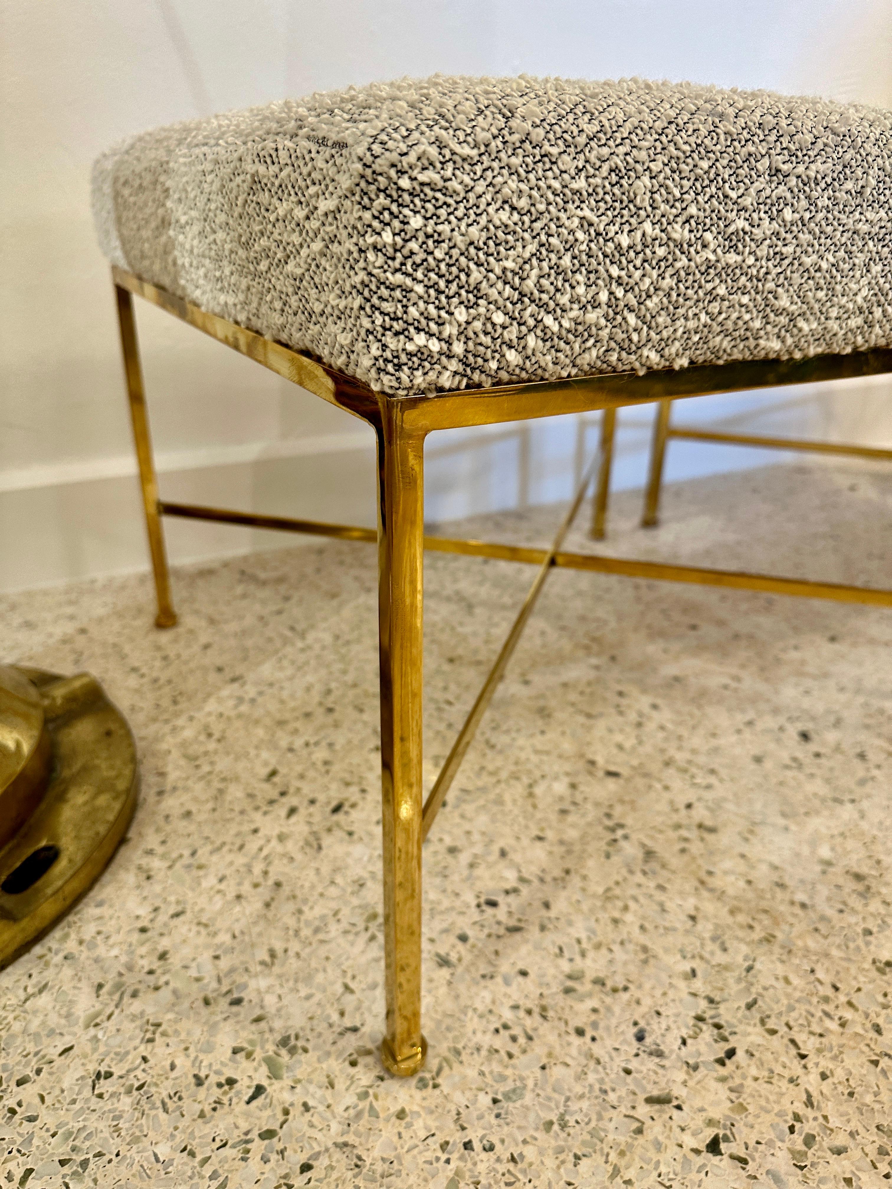 These lovely classic X design brass stools/ benches by Paul McCobb, are in wonderful solid condition. NEW nubby boucle style fabric and an amazing patina to brass.