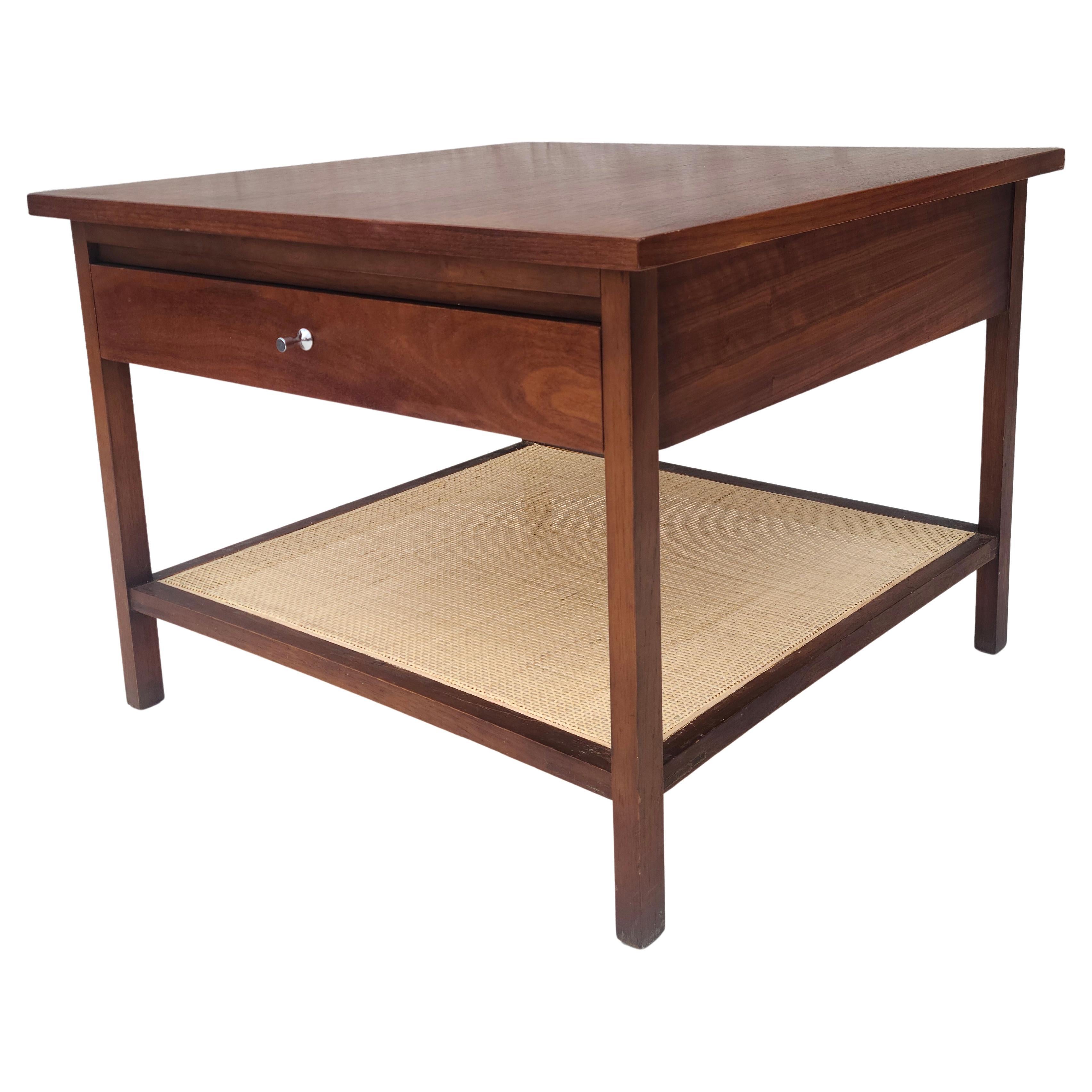 Please feel free to reach out for accurate shipping to your location.

Walnut and Cane end table from Paul McCobb's Delineator Group 
for Lane.
