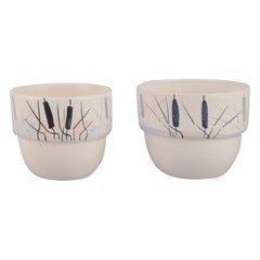 Paul Milet for Sevres, France. Pair of ceramic plant pot holders.