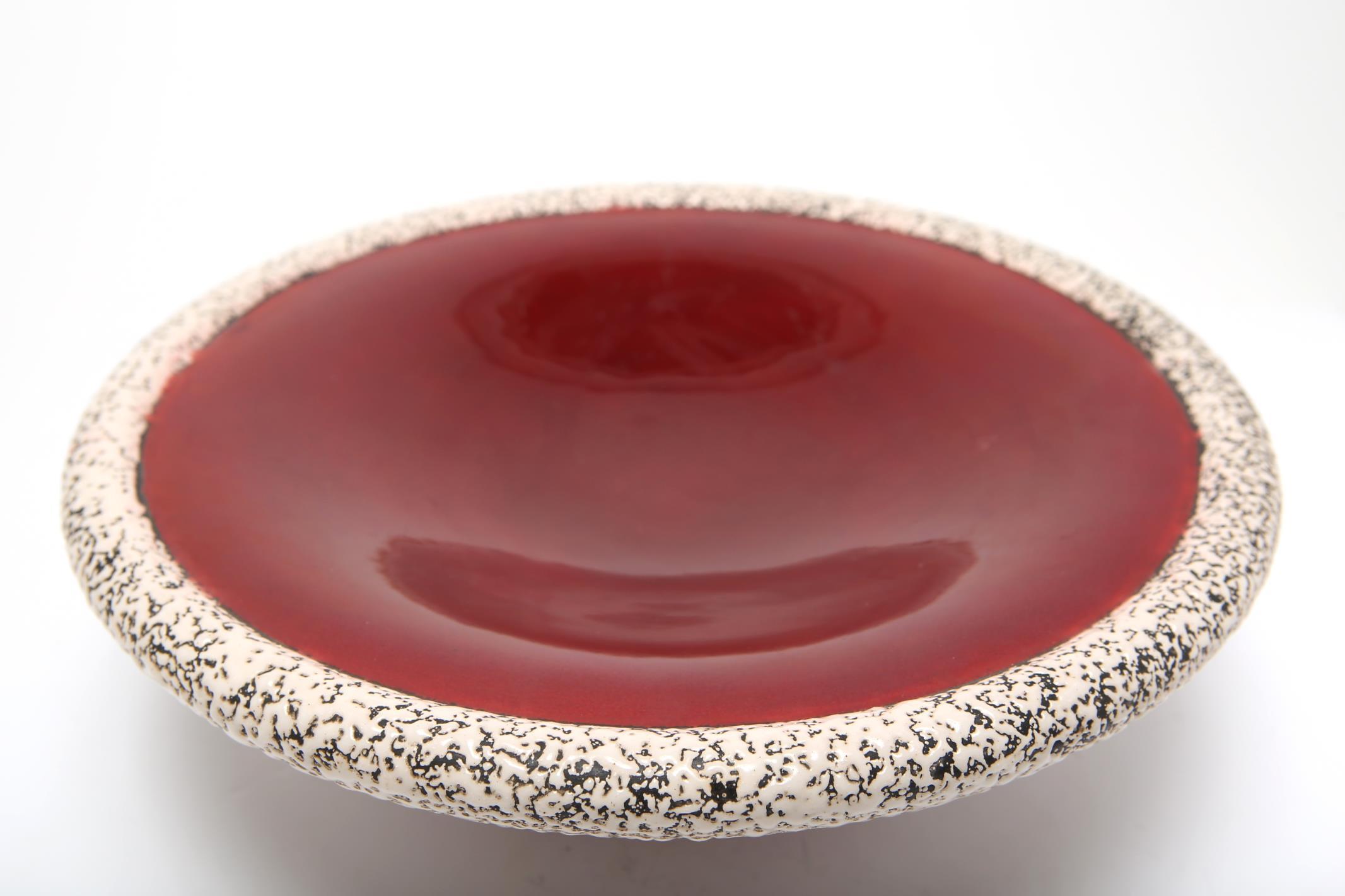 French Art Deco Sevres ceramic compote or table centerpiece designed by Paul Milet in the 1930s. The piece has oxblood red and anthracite gray glazes and a cream enamel 