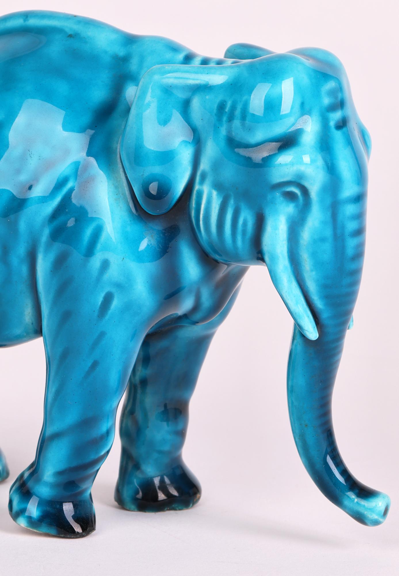 Türkis glasierte Elefantenfigur aus Keramik von Paul Milet Sevres    (Art déco) im Angebot