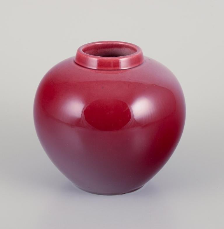 French Paul Millet for Sevres, France. Unique lidded ceramic jar with oxblood glaze.  For Sale