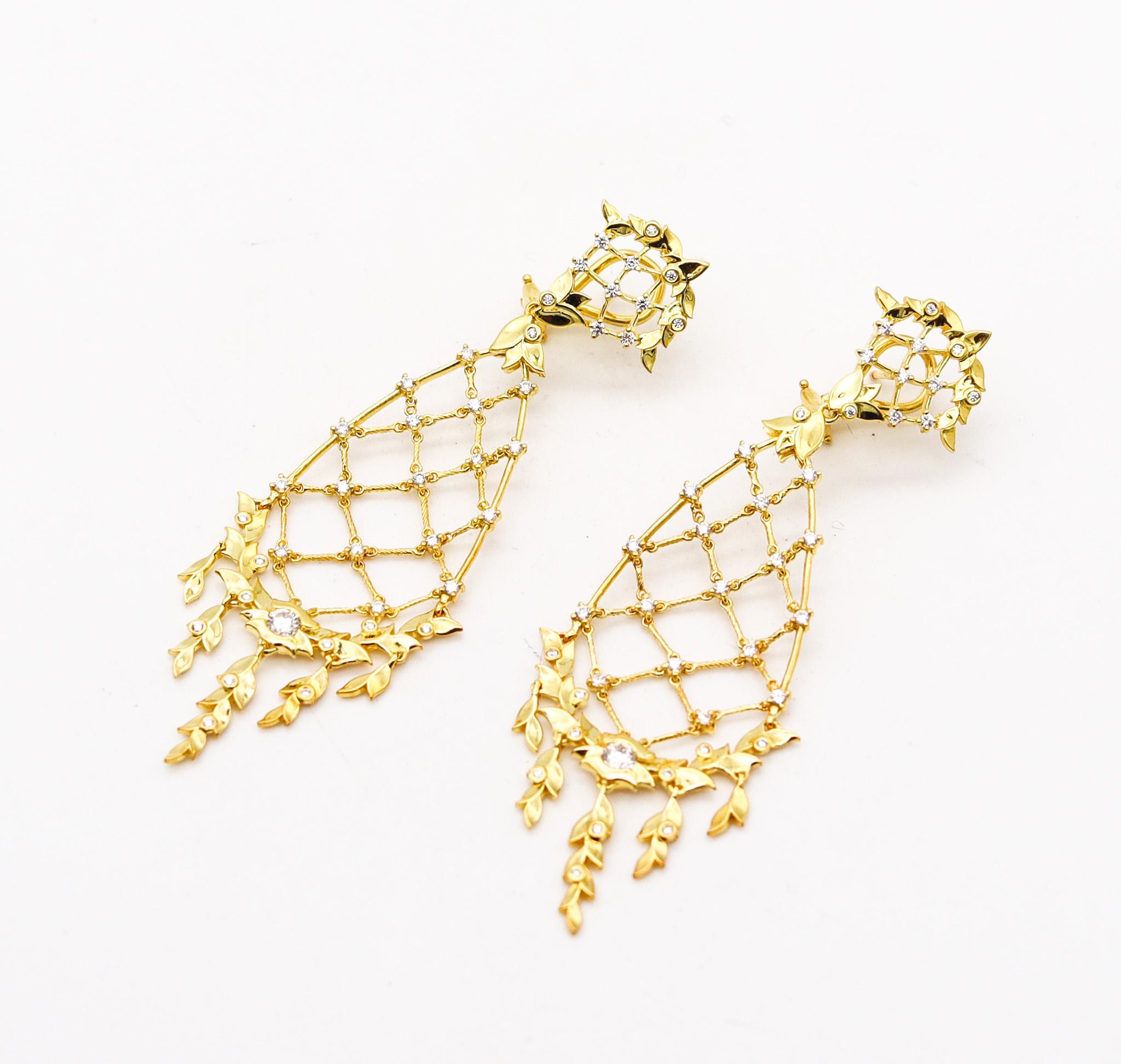 Dangle drop earrings designed by Paul Morelli.

Beautiful pair of dangle earrings, created in Philadelphia United States at the jewelry atelier of Paul Morelli. These gorgeous pair of earrings has been crafted with classic baroque-chandeliers
