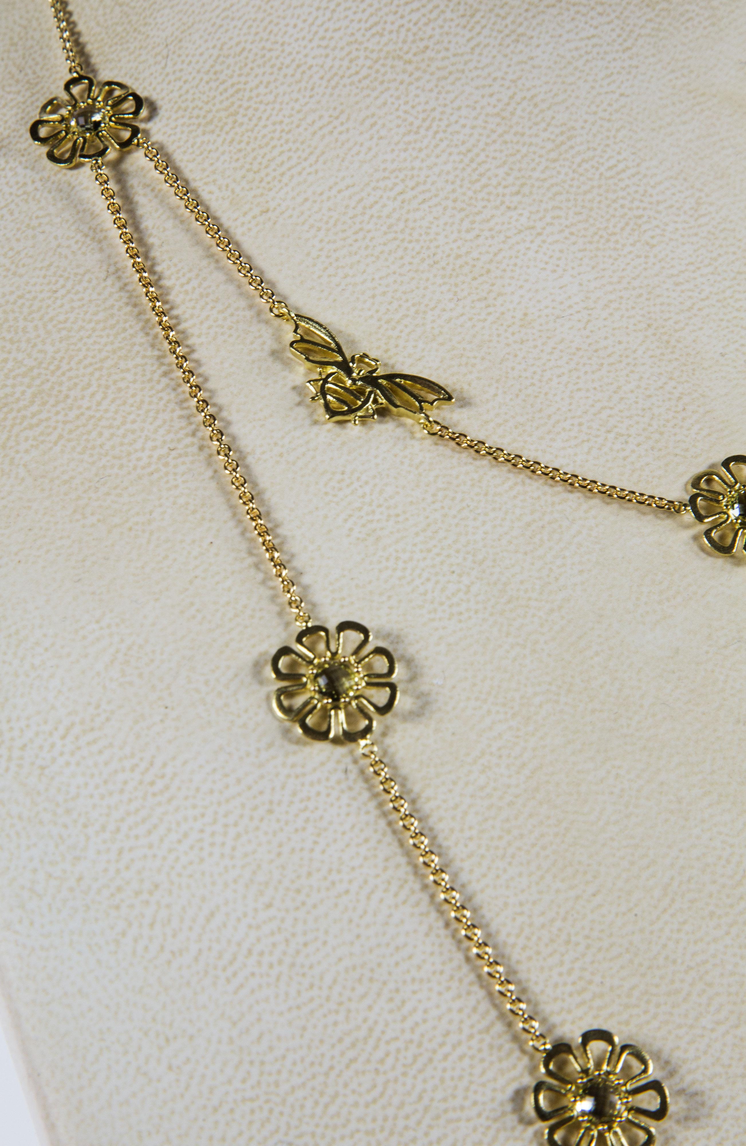 Beautiful signed Paul Morelli Necklace featuring Butterfly and Flower designs; crafted in 18kt Yellow Gold and set with Citrine gemstones; approx. 18”Long; Signature Paul Morelli with great attention to detail; notice the Butterfly motif closure!  A