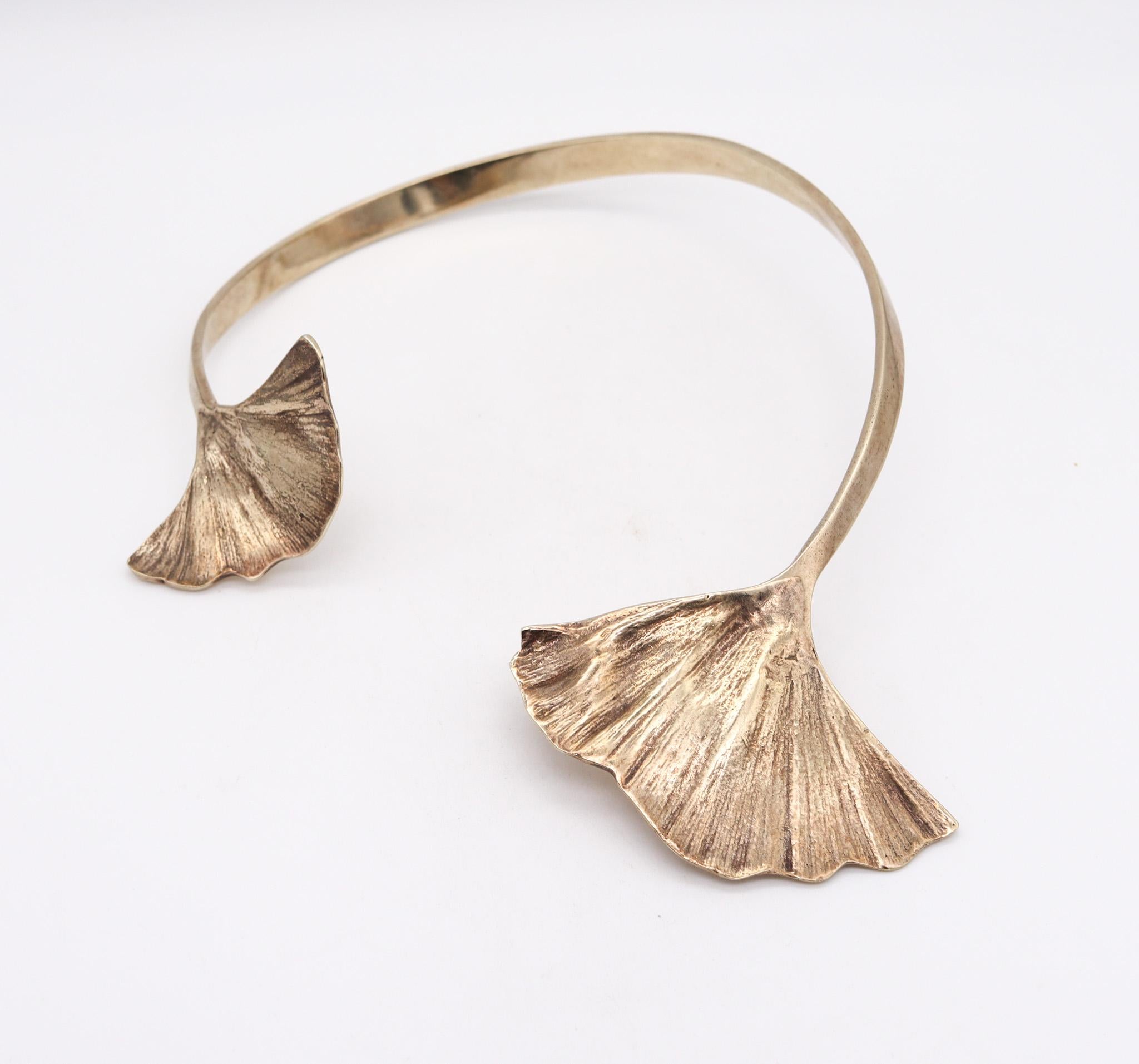 Double gingko necklace designed by Paul Oudet (1946-).

A prototype sculptural cuff bracelet, created in Paris France by the sculptor Paul Oudet, back in the 1970. This organic piece has been crafted as an unique piece in solid .800/.999 silver with