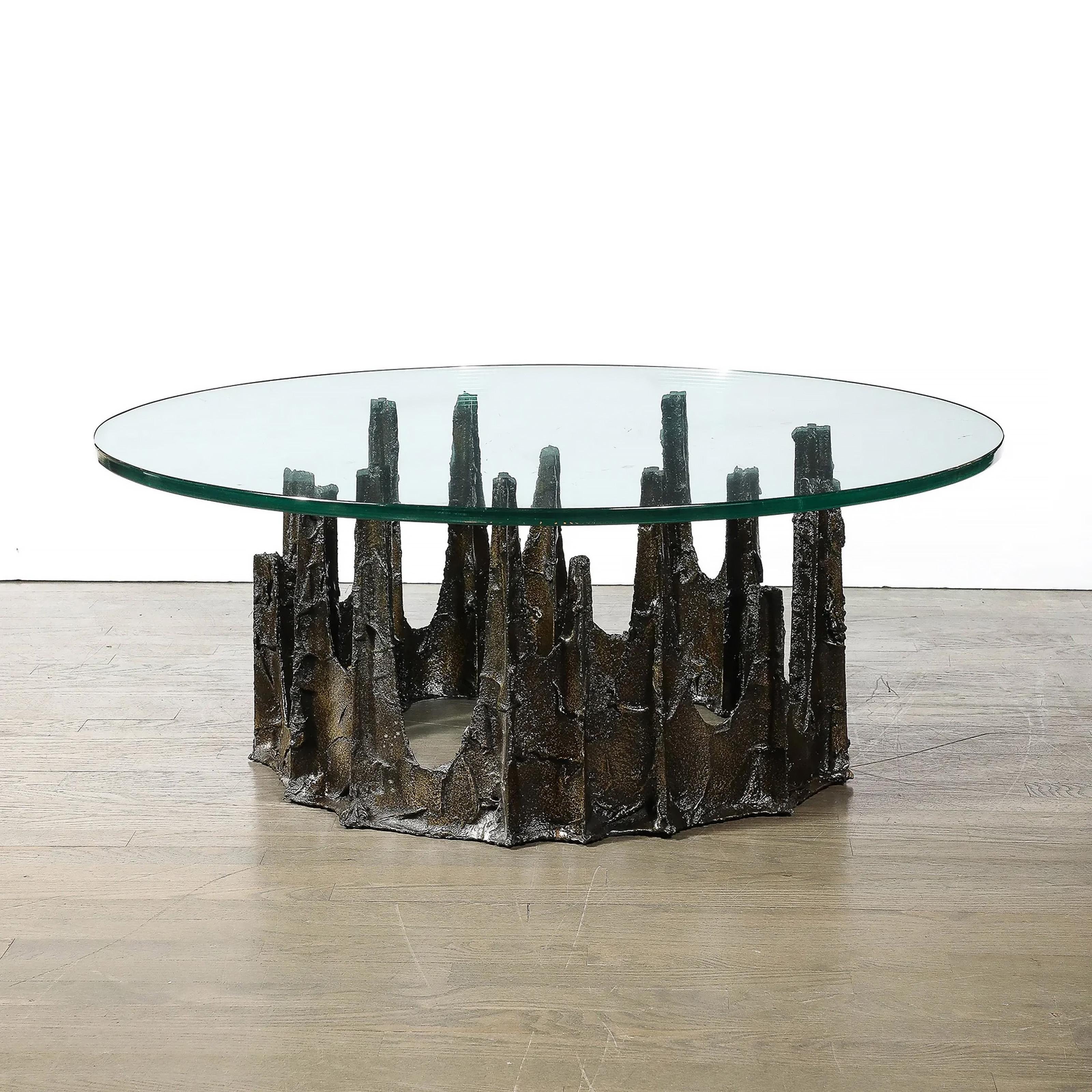Paul R. Evans, American (1931 - 1987) - Bronze Stalagmite Coffee / Cocktail Table, Year:  1969, Medium:  Patinated Bronze Table with round glass top, signature and date inscribed on base, Size:  16 x 42 in. (40.64 x 106.68 cm), Base: 15 x 28 inches,