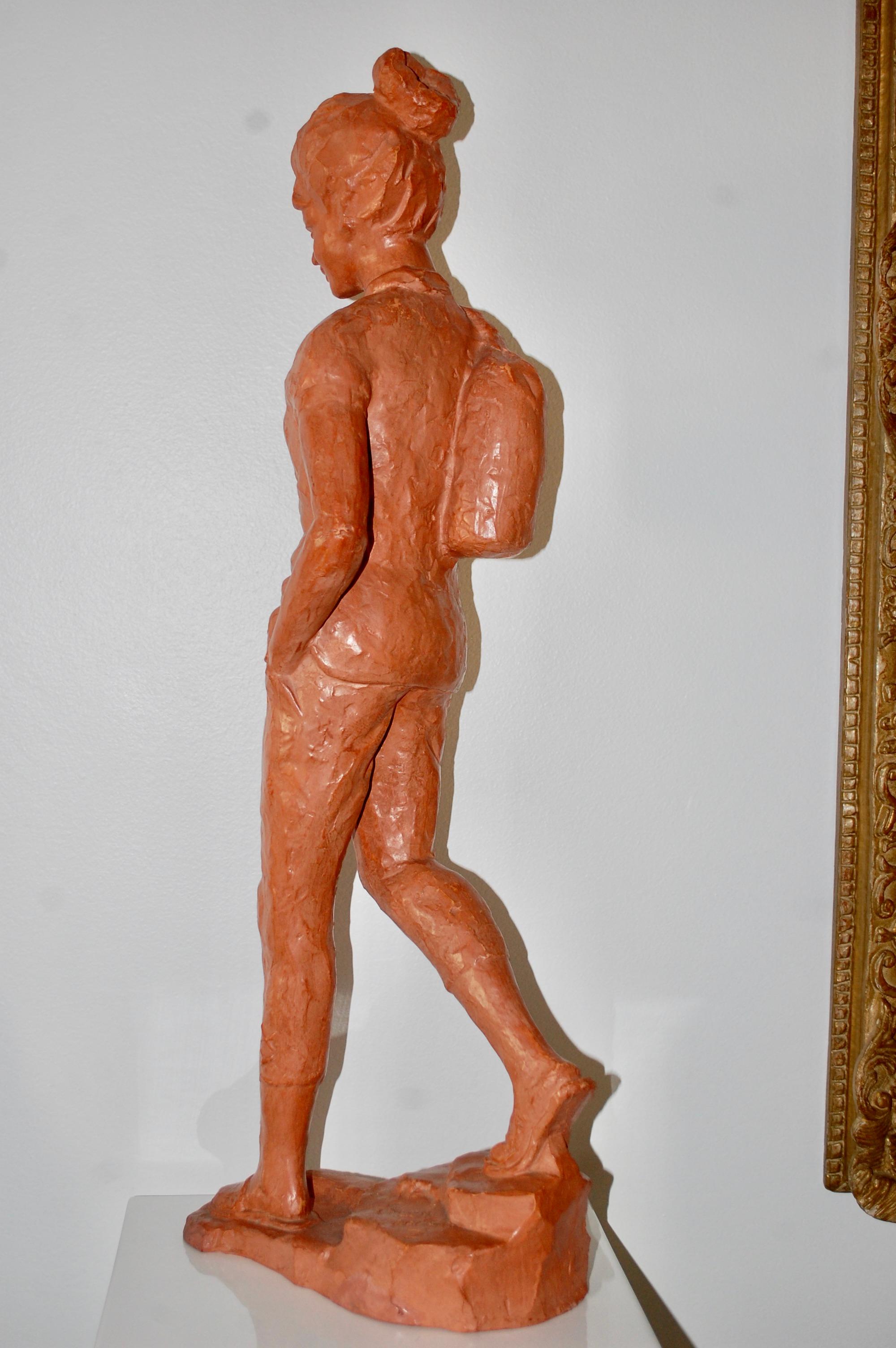 Young Woman Walking With Backpack Terra Cotta  - Modern Sculpture by Paul Serste