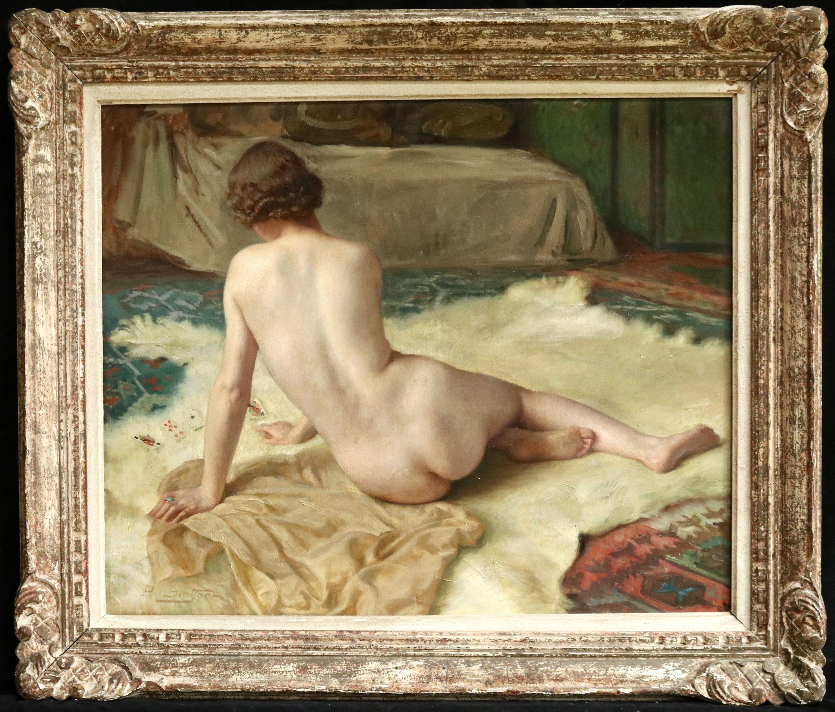 Oil on canvas by Paul Sieffert of a nude playing cards as she rests on a an animal skin rug. Signed lower let and further signed, dated 1939 and numbered verso. Framed dimensions are 26 inches high by 30 inches wide. This work is number 328 in the