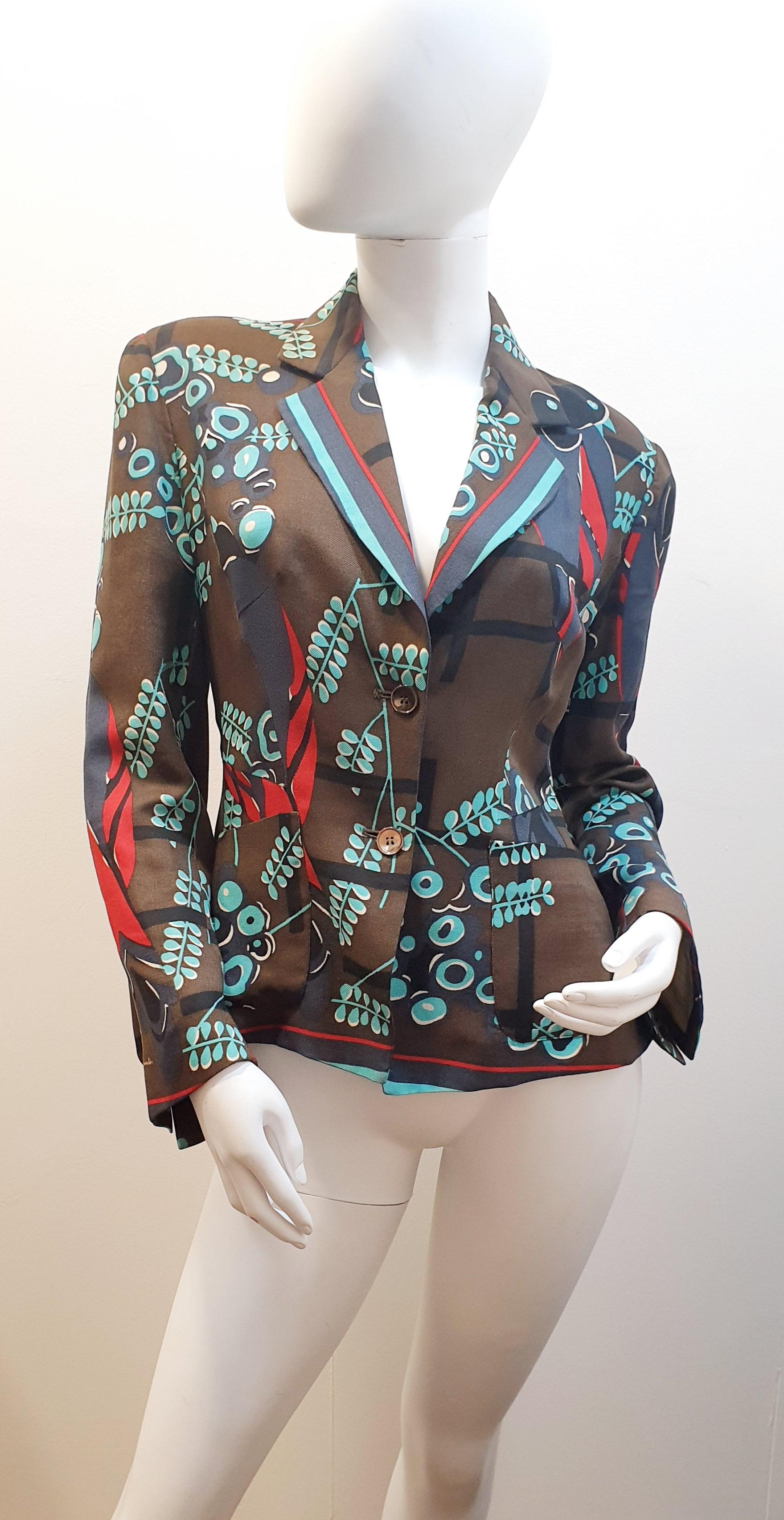 PAUL SMITH Brown Silk Cotton Blend Bold Floral Print Blazer Jacket
Material: 70% Wool 30% Silk
Colour:	Brown	
Type:	Jacket
Size   42

Our Company Fashion Division is specialized in European Fashion designers, clothing, handbags, accessories and as