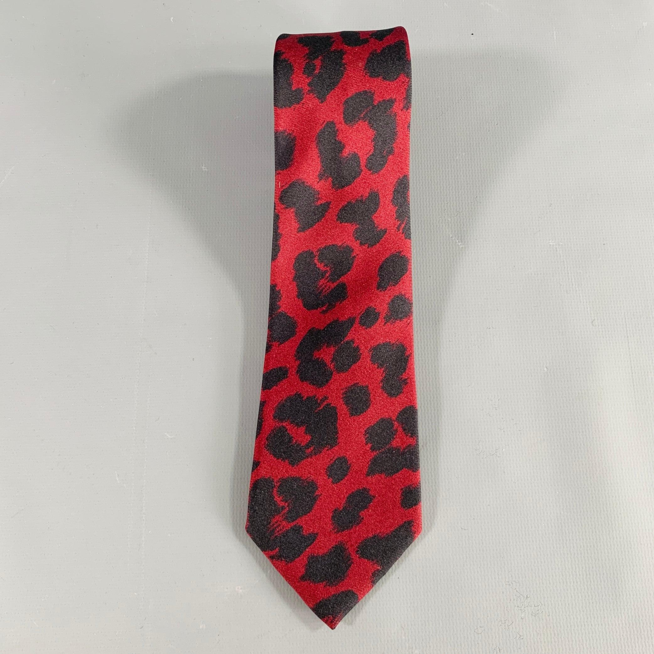 PAUL SMITH
necktie in a burgundy and black silk featuring an animal print pattern. Made in Italy. Very Good Pre-Owned Condition.Width: 2.5 inches Length: 55 inches 
  
  
 
Sui Generis Reference: 133443
Category: Tie
More Details
    
Brand:  PAUL