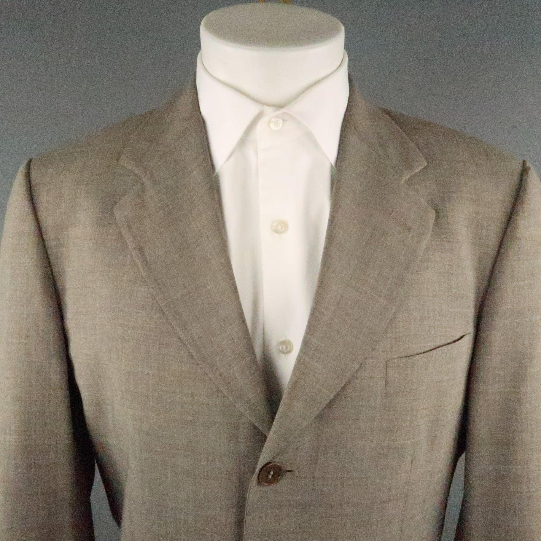 PAUL SMITH suit comes in a brown rayon featuring a notch lapel, single breasted, flap pockets, and a matching flat front style pant. Made in Italy.
Very Good Pre-Owned Condition.
 

Marked:   40
 

Measurements: 
  
-Jacket
l	Shoulder: 19.5 inches