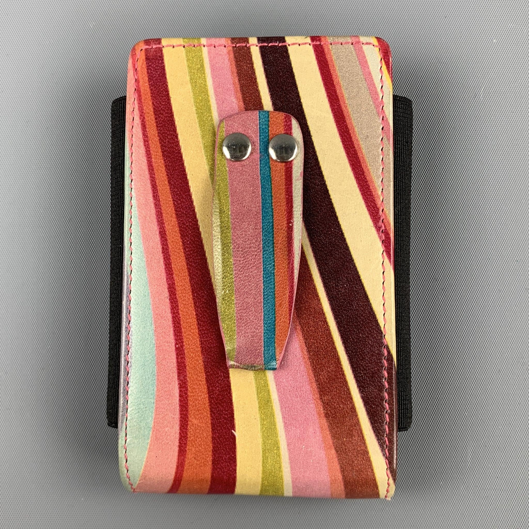 PAUL SMITH phone case comes in a multi-color leather featuring a back clip. Made in Italy.Good Pre-Owned Condition. 

Measurements: 
  2.25 inches  x 4 inches 
  
  
 
Reference: 57669
Category: Bags & Leather Goods
More Details
    
Brand:  PAUL