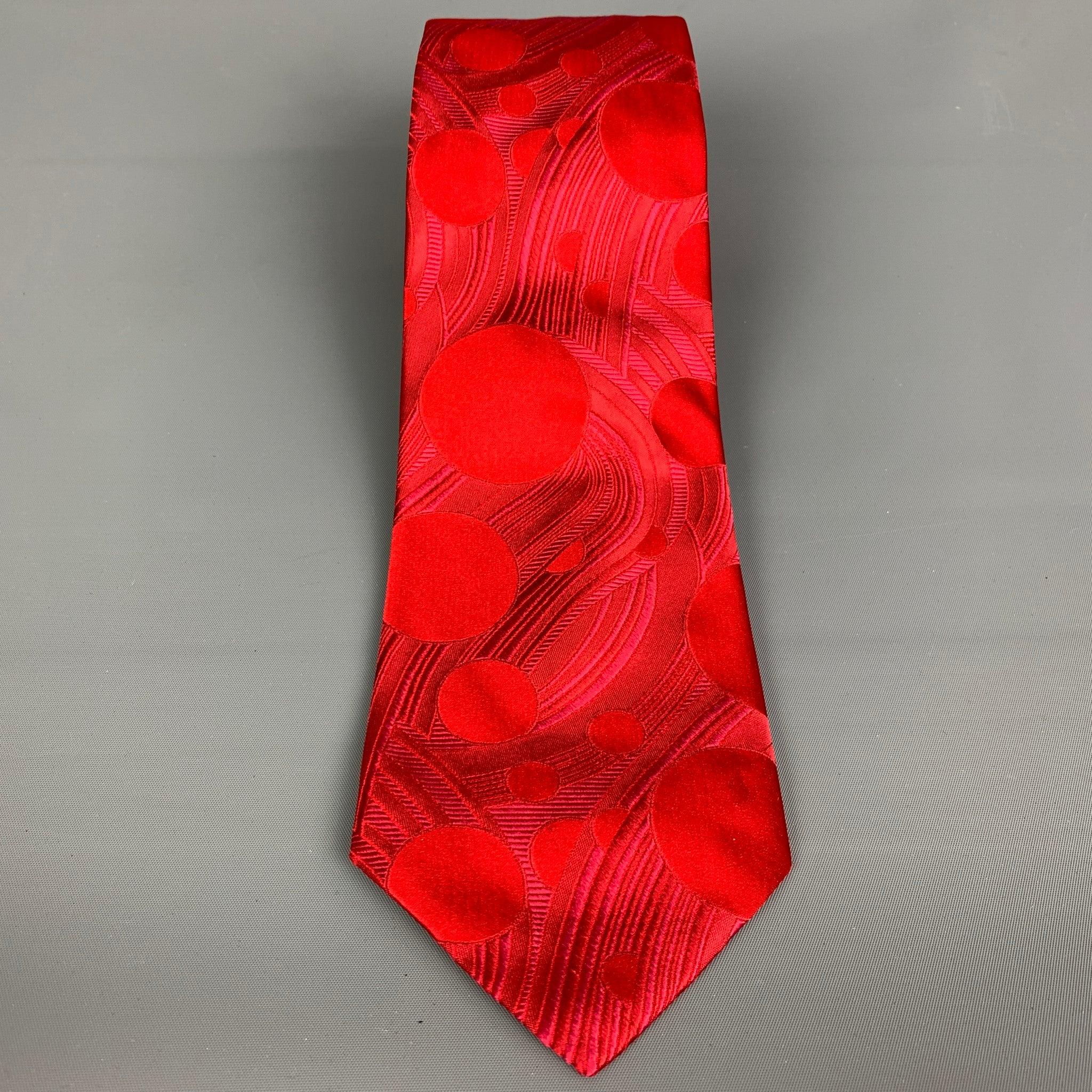 PAUL SMITH necktie comes in red abstract print silk jacquard. Made in Italy.Very Good Pre-Owned Condition. Minor marks.Width: 4 inches Length: 62 inches  

  
  
 
Reference: 103976
Category: Tie
More Details
    
Brand:  PAUL SMITH
Color: 