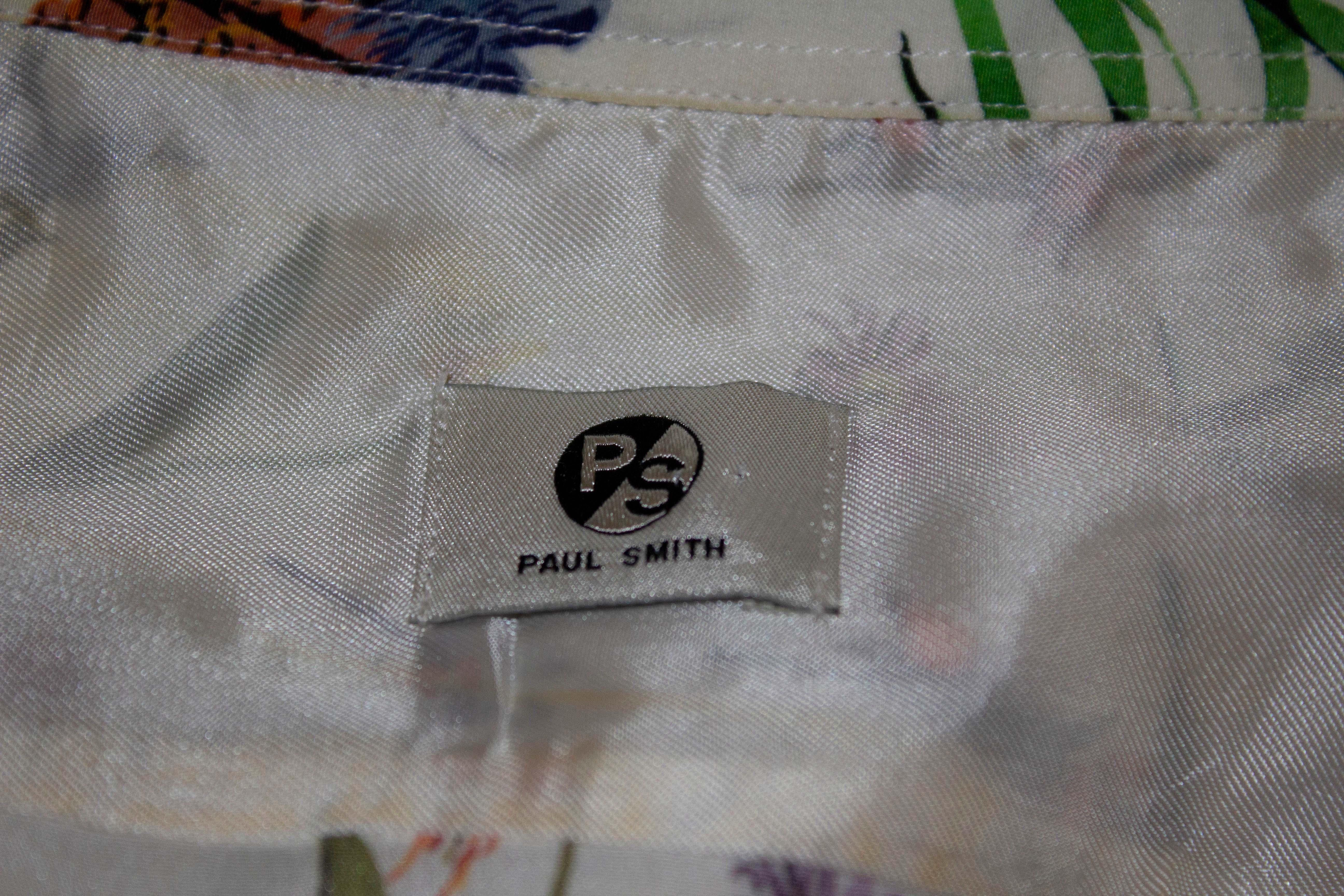 A pretty silk blouse by Paul Smith, PS line. The blouse has a breast pocket on the left hand side and single button cuffs. Measurements: Size 44, bust up 39'',length 25''