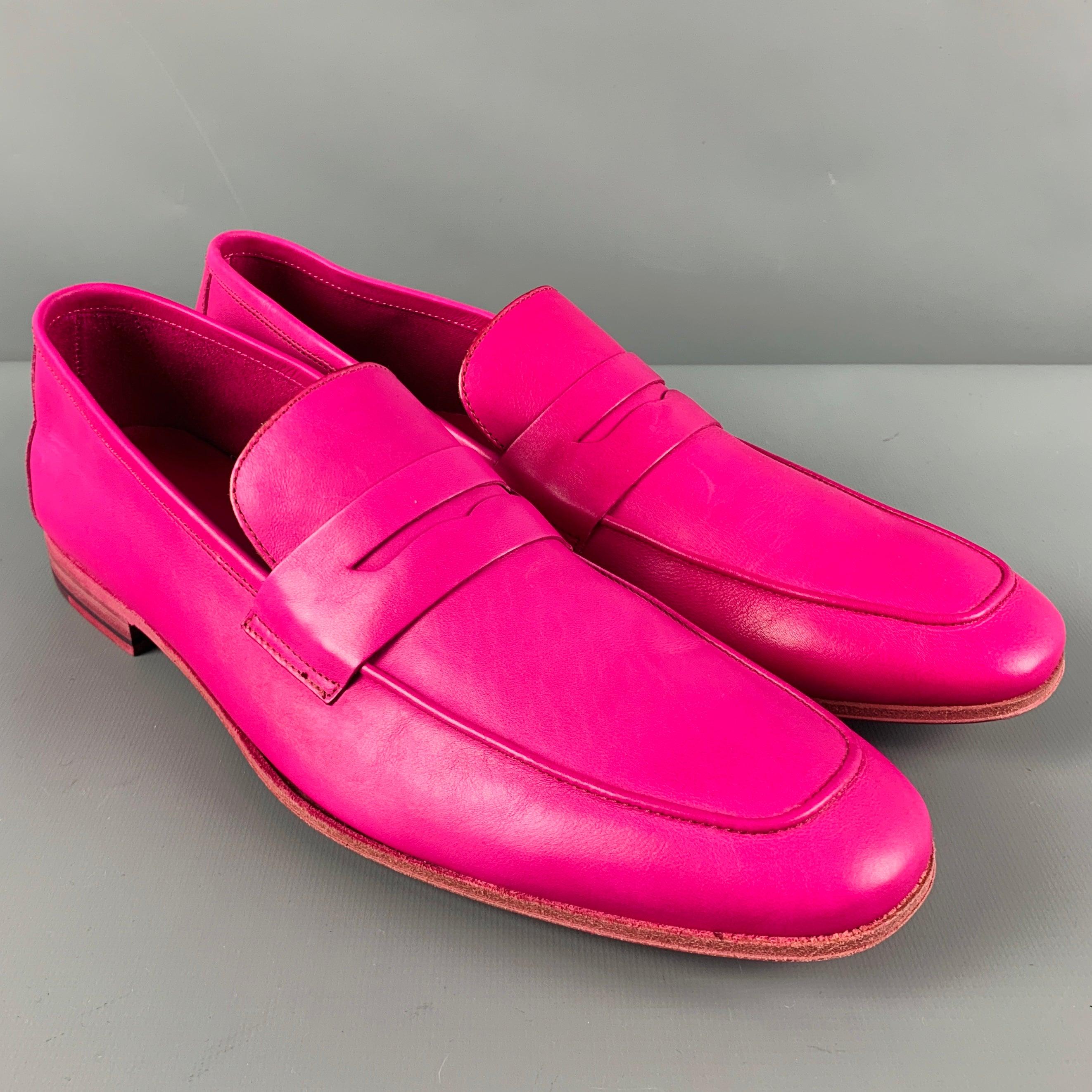 PAUL SMITH loafers in a fuchsia pink leather fabric featuring a slip-on penny style. Made in Italy.Very Good Pre-Owned Condition. 

Marked:   579010 V218 43 9Outsole: 11.5 inches  x 3.75 inches 
  
  
 
Reference No.: 128669
Category: Loafers
More