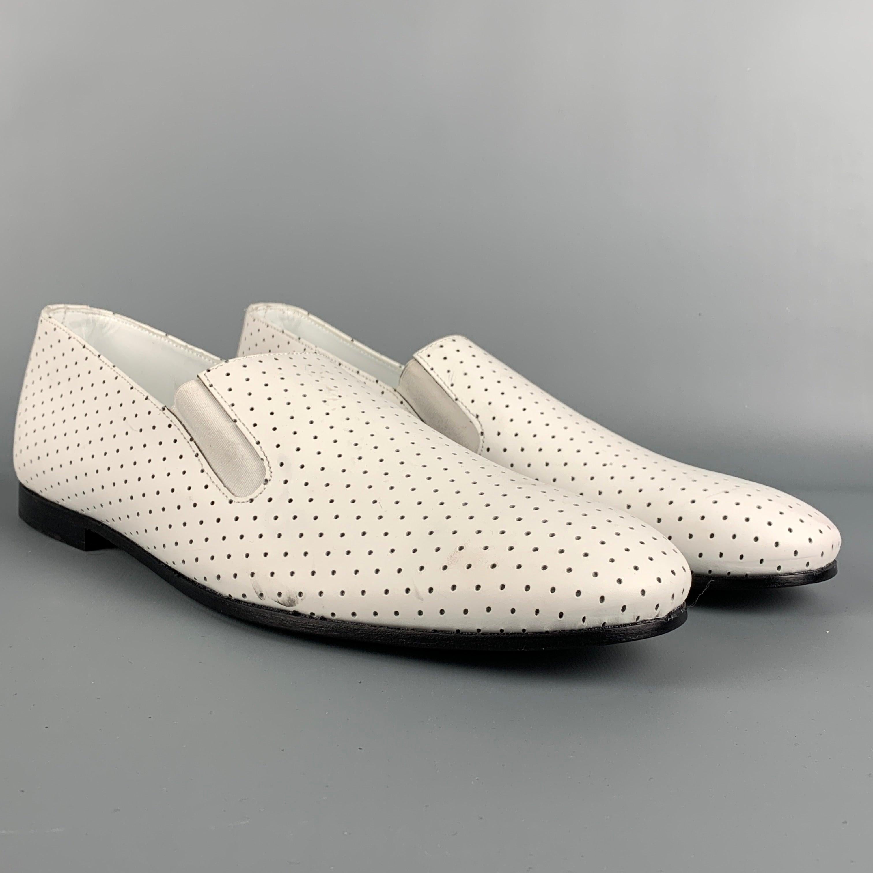 PAUL SMITH loafers comes in a white perforated leather featuring a slip on style and a round toe. Made in Italy.
Very Good
Pre-Owned Condition. 

Marked:   10Outsole: 11.5 inches  x 4 inches 
  
  
 
Reference: 113835
Category: Loafers
More Details
