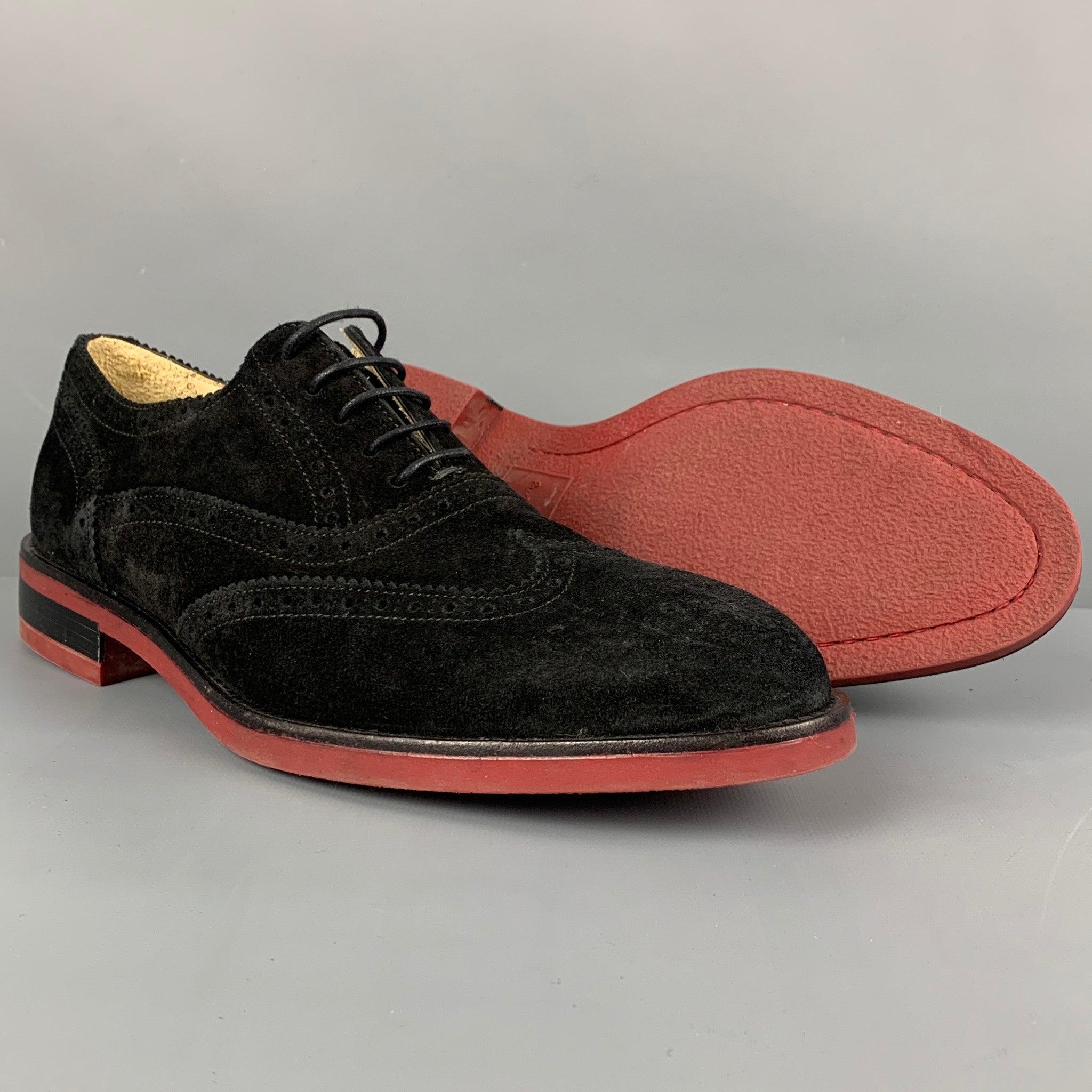 PAUL SMITH Size 10.5 Black Brick Perforated Leather Wingtip Loafers In Good Condition For Sale In San Francisco, CA
