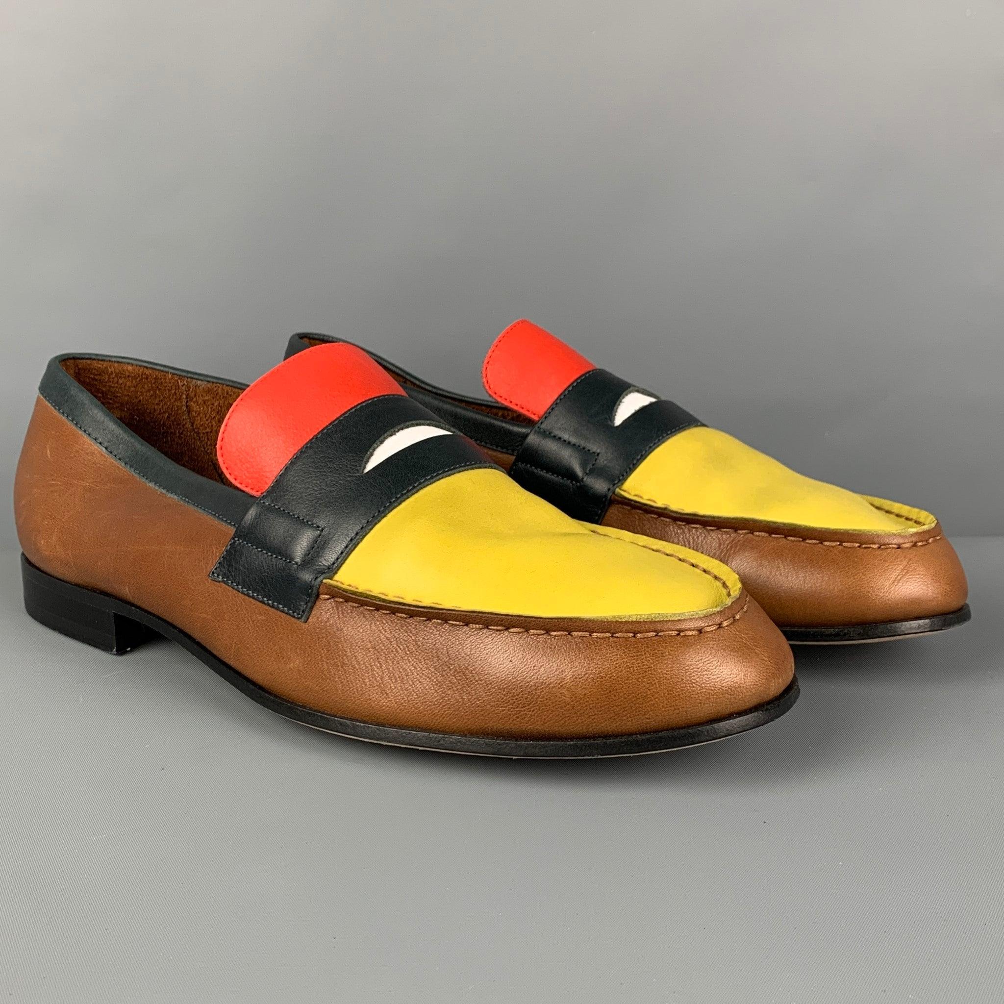 PAUL SMITH loafers comes in a multi-color leather featuring a color block style and a penny strap. Made in Italy. Very Good
Pre-Owned Condition. 

Marked:   10.5Outsole: 12 inches  x 4 inches 
  
  
 
Reference: 117252
Category: Loafers
More