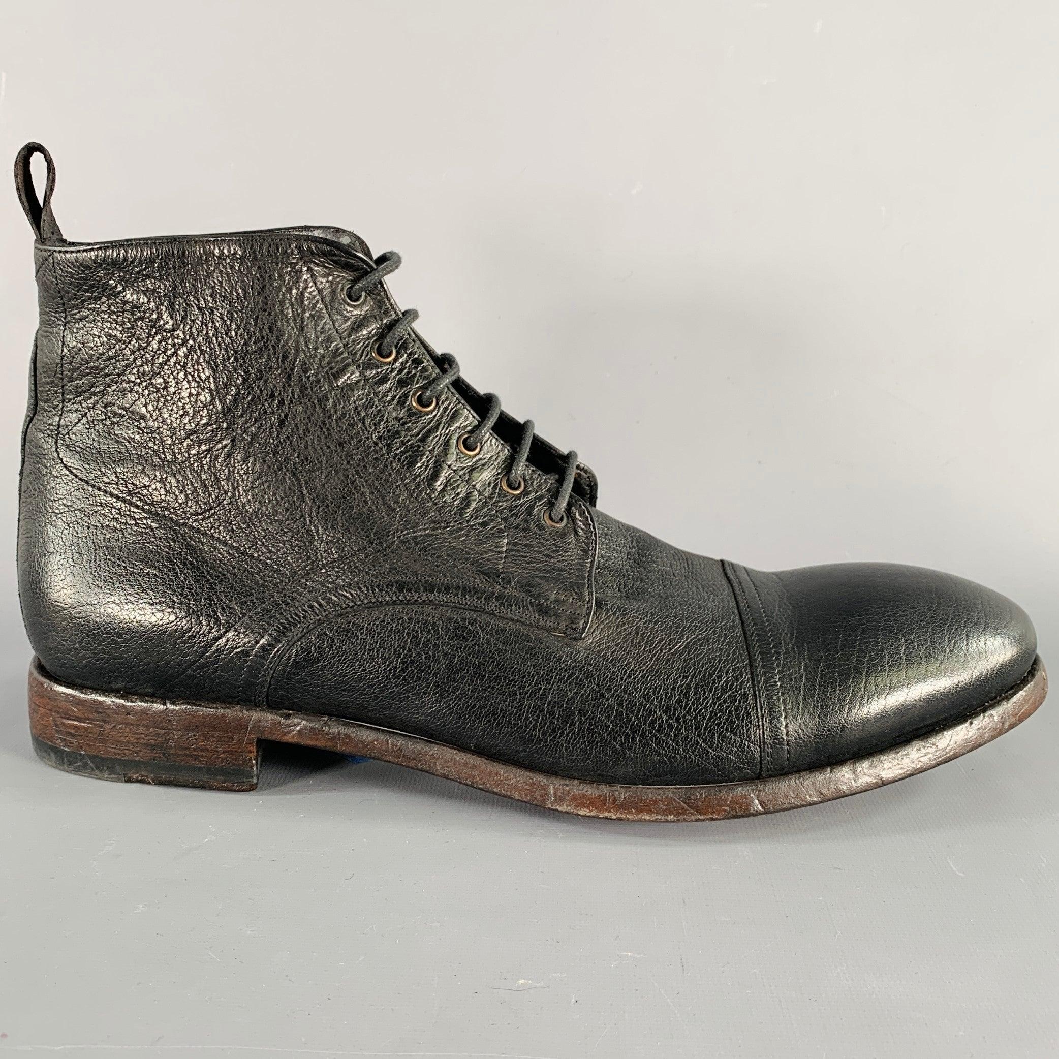 PAUL SMITH boots
in a black leather featuring a cap toe, leather sole, and lace-up closure. Comes with box. Made in Italy.Very Good Pre-Owned Condition with Box. Minor signs of wear. 

Marked:    

Measurements: 
  Length: 12.25 inches Width: 4