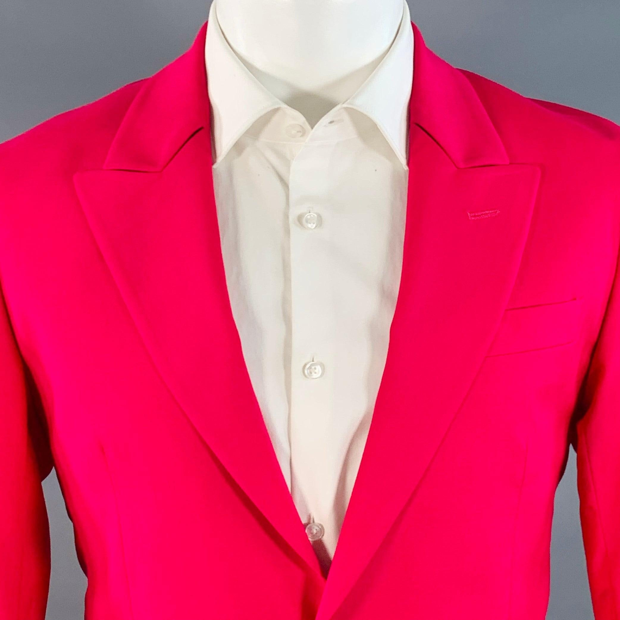PAUL SMITH sport coat
in a fuchsia pink wool stretch blend featuring a peak lapel, single vented back, and double button closure.
Made in Italy.Excellent Pre-Owned Condition. 

Marked:   36/46 

Measurements: 
 
Shoulder: 17 inches Chest: 37 inches