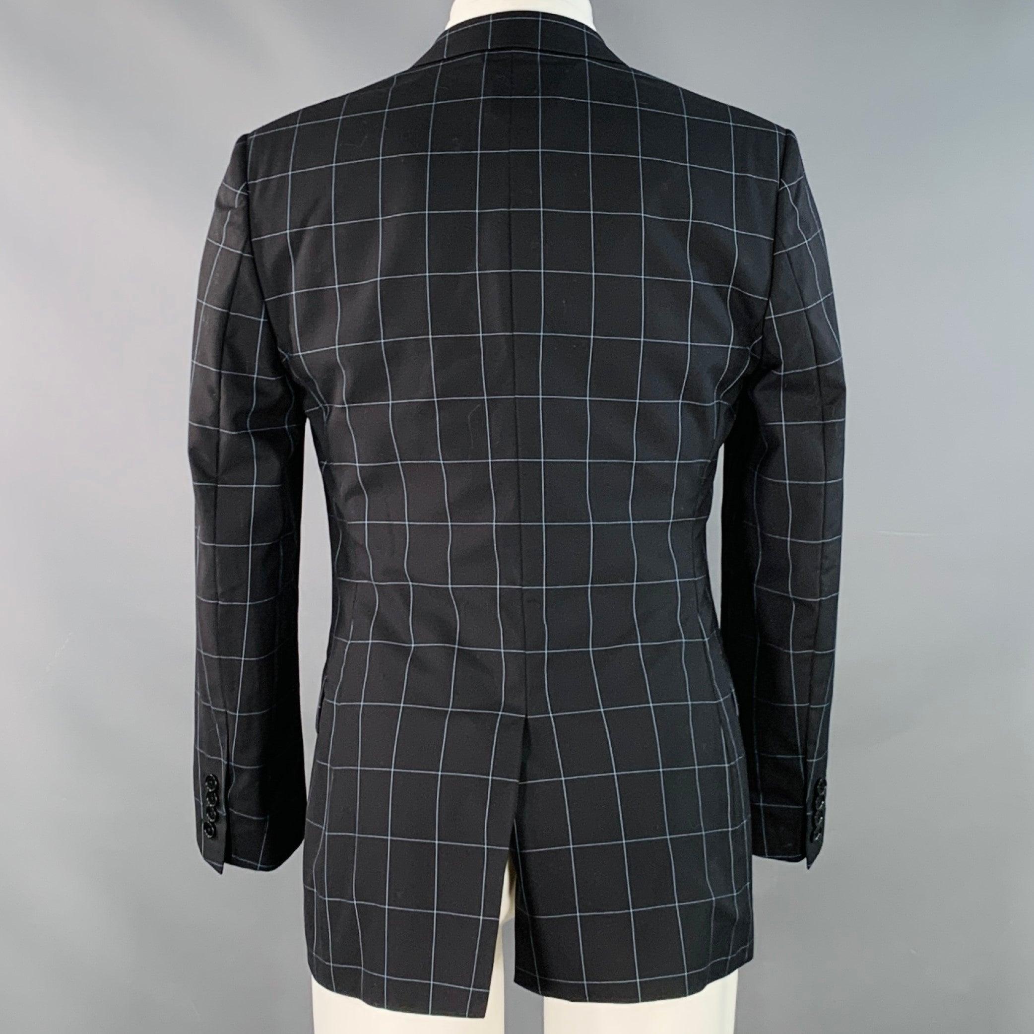 Nero Paul Smith taglia 38 Cappotto sportivo in lana con risvolto a tacche, nero e blu. in vendita