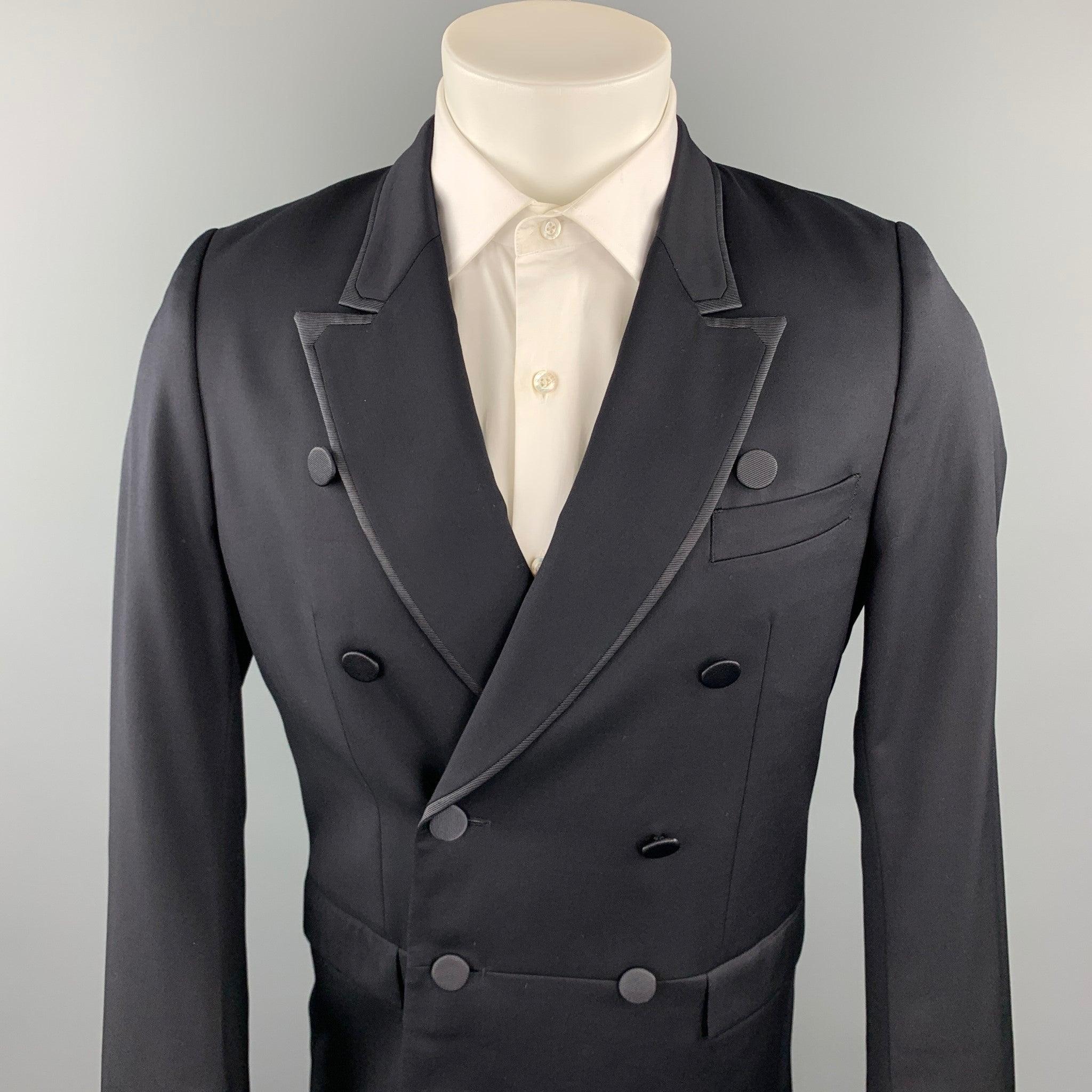 PAUL SMITH tuxedo sport coat comes in a black wool / cashmere featuring a peak lapel, flap pockets, and a double breasted closure. Made in Japan.Excellent
Pre-Owned Condition. 

Marked:   38
 

Measurements: 
 
Shoulder: 16.5 inches 
Chest: 38