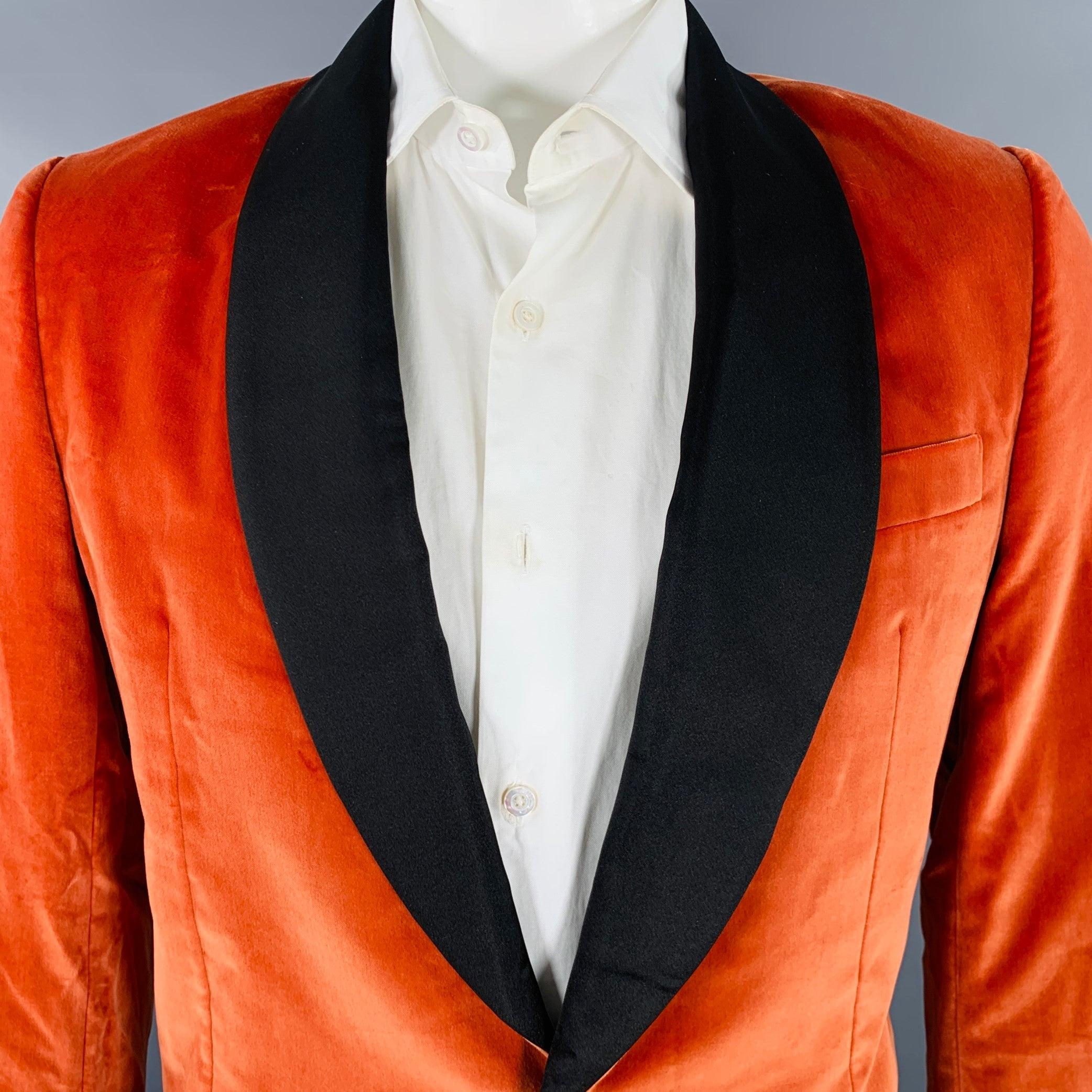 PAUL SMITH sport coat
in an orange cotton velvet fabric featuring a contrasting black shawl collar, double vented back, and single button closure. Made in Italy.Excellent Pre-Owned Condition. 

Marked:   42/6R 

Measurements: 
 
Shoulder: 16.5