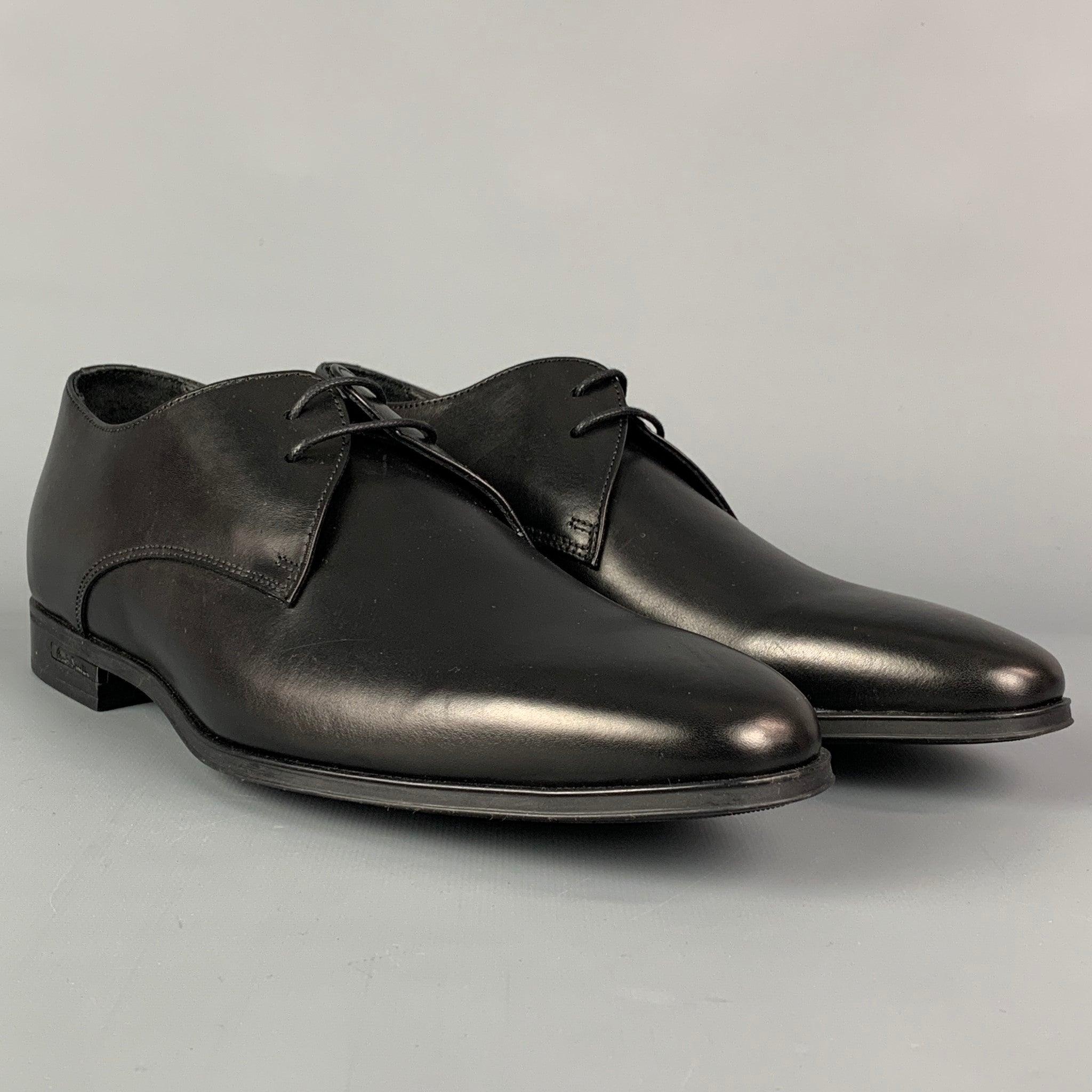 PAUL SMITH shoes comes in a black leather featuring a rubber sole and a lace up closure. Made in Italy.
Very Good
Pre-Owned Condition. 

Marked:  
C0N01 6 40Outsole: 11.5 inches  x 4 inches 
  
  
 
Reference: 114642
Category: Lace Up Shoes
More