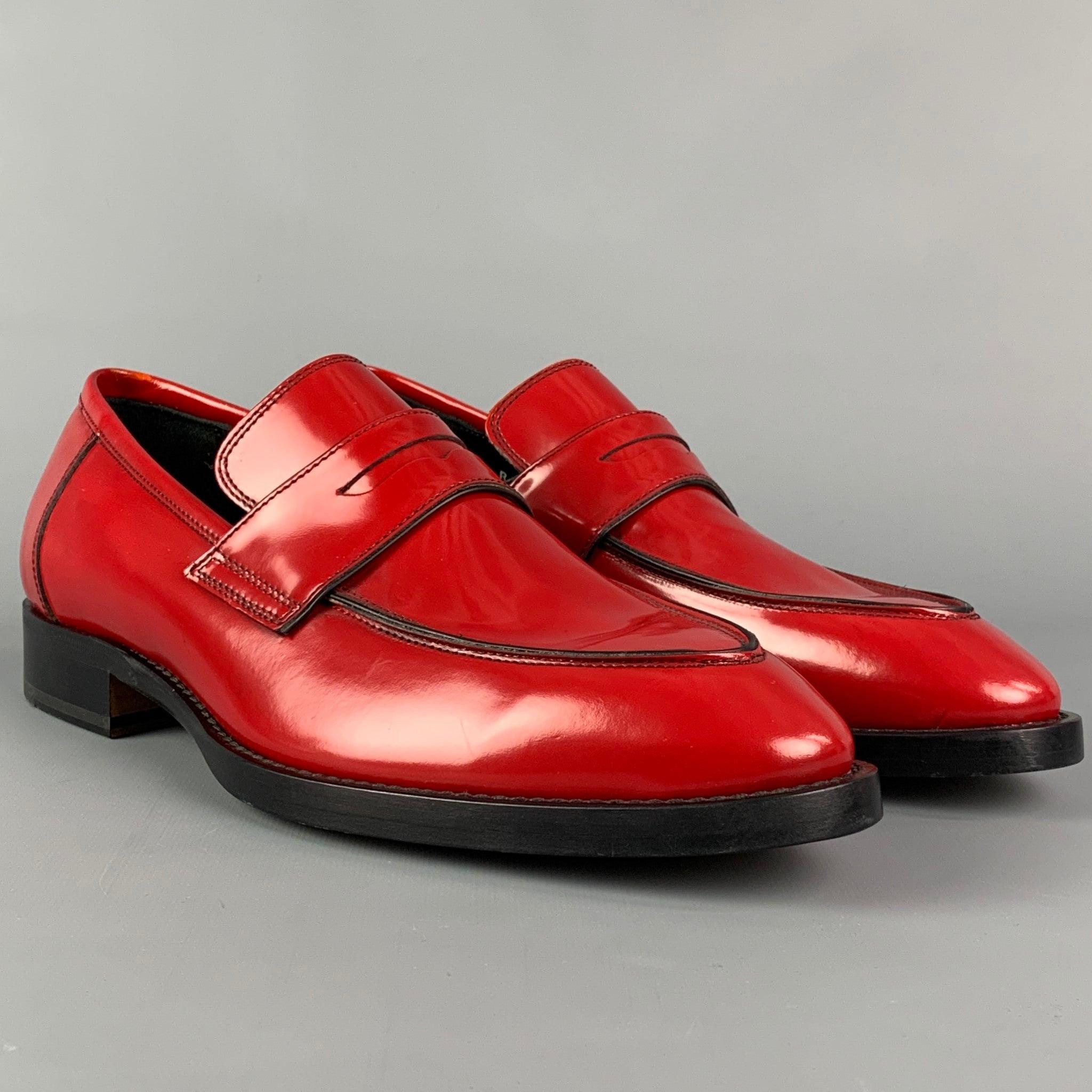 PAUL SMITH loafers comes in a red leather featuring a penny strap, slip on, and a leather sole. Made in Italy. Includes box.
Very Good
Pre-Owned Condition. 

Marked:   R1D05 7 41Outsole: 11.75 inches  x 4.25 inches 
  
  
 
Reference: