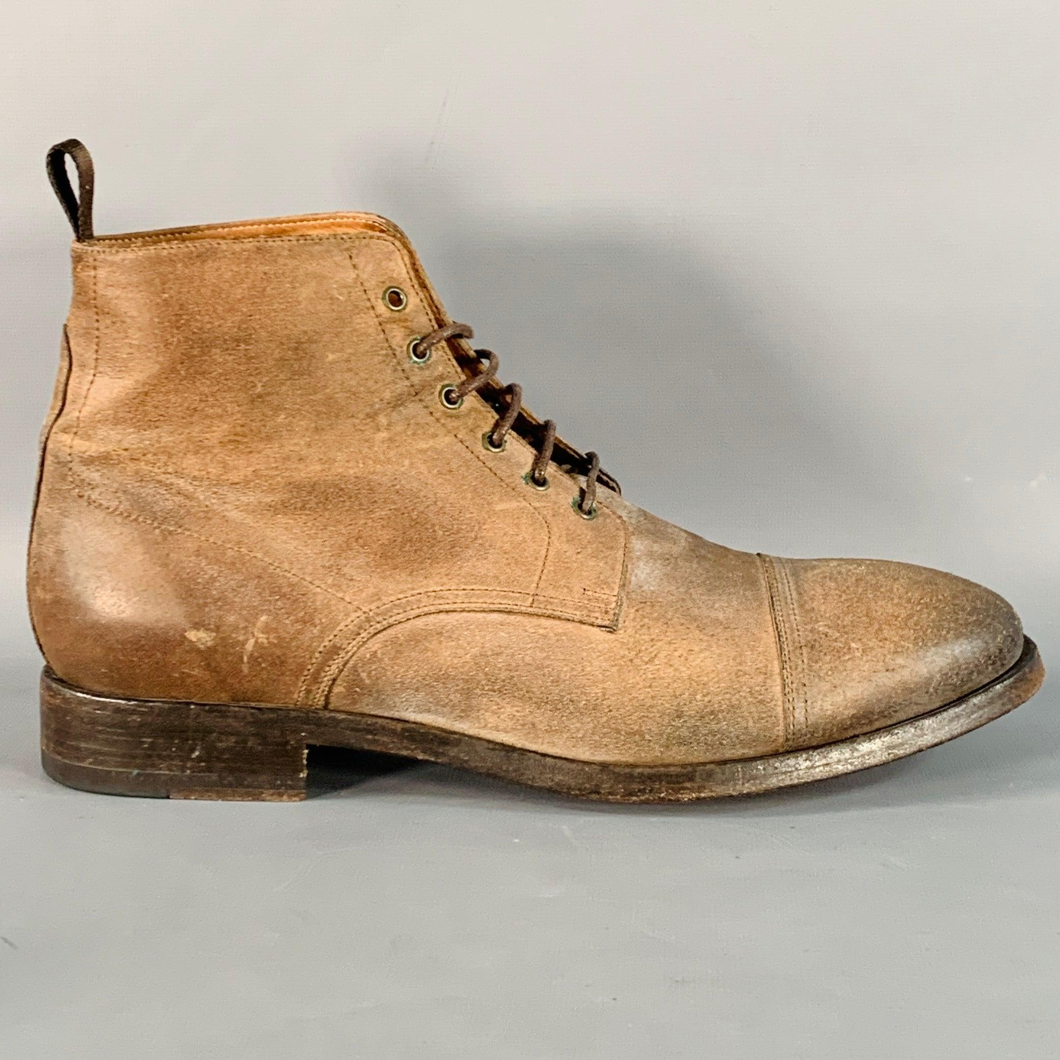 Stivali di Paul Smith
in pelle marrone anticato, con punta a cappuccio, suola in cuoio e chiusura con lacci. Made in Italy.Ottime condizioni di usato.  

Contrassegnato:   395279 H 007 8 42 

Misure: 
  Lunghezza: 11,25 pollici Larghezza: 4 pollici